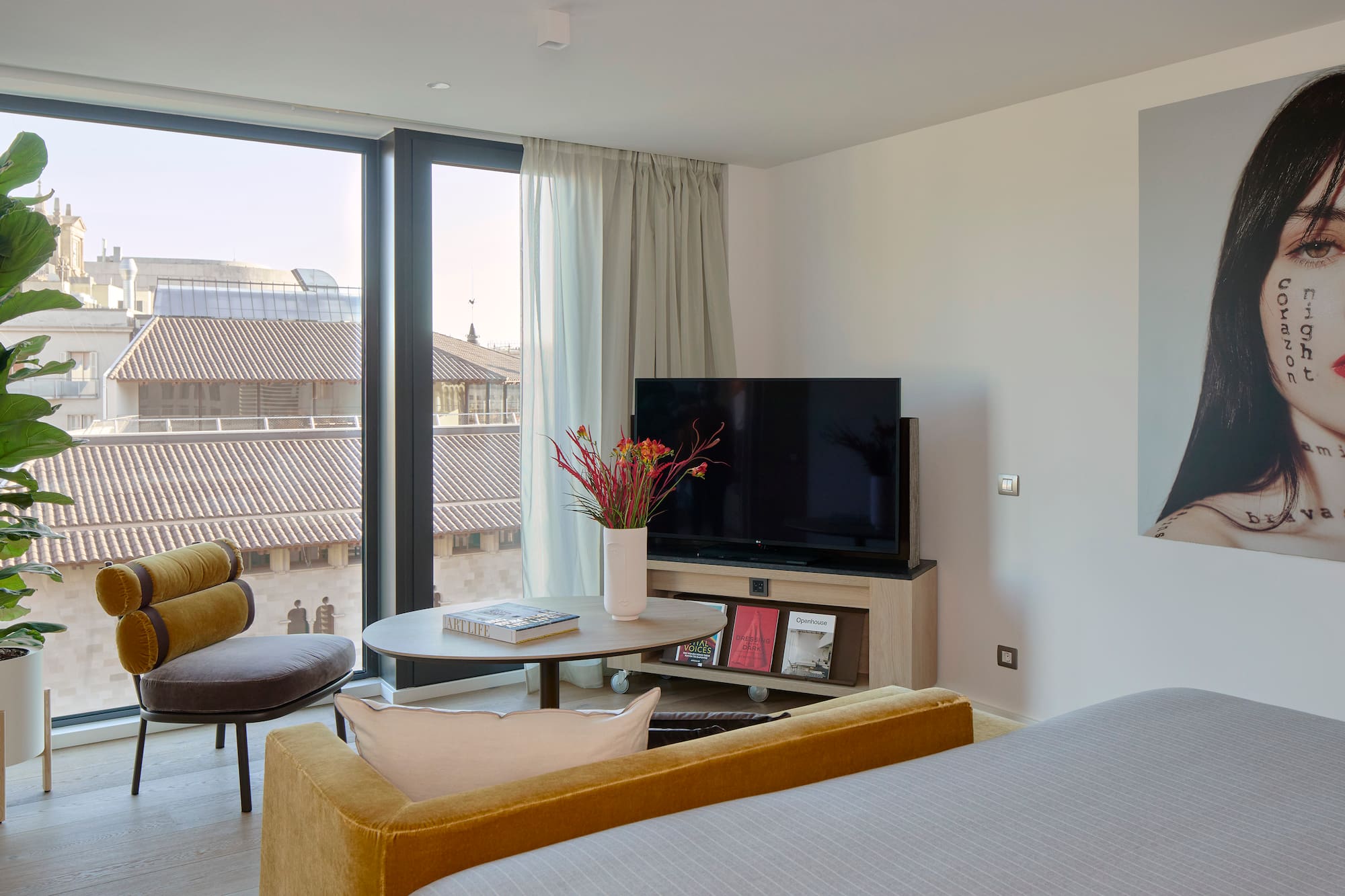 a room with a television and a chair