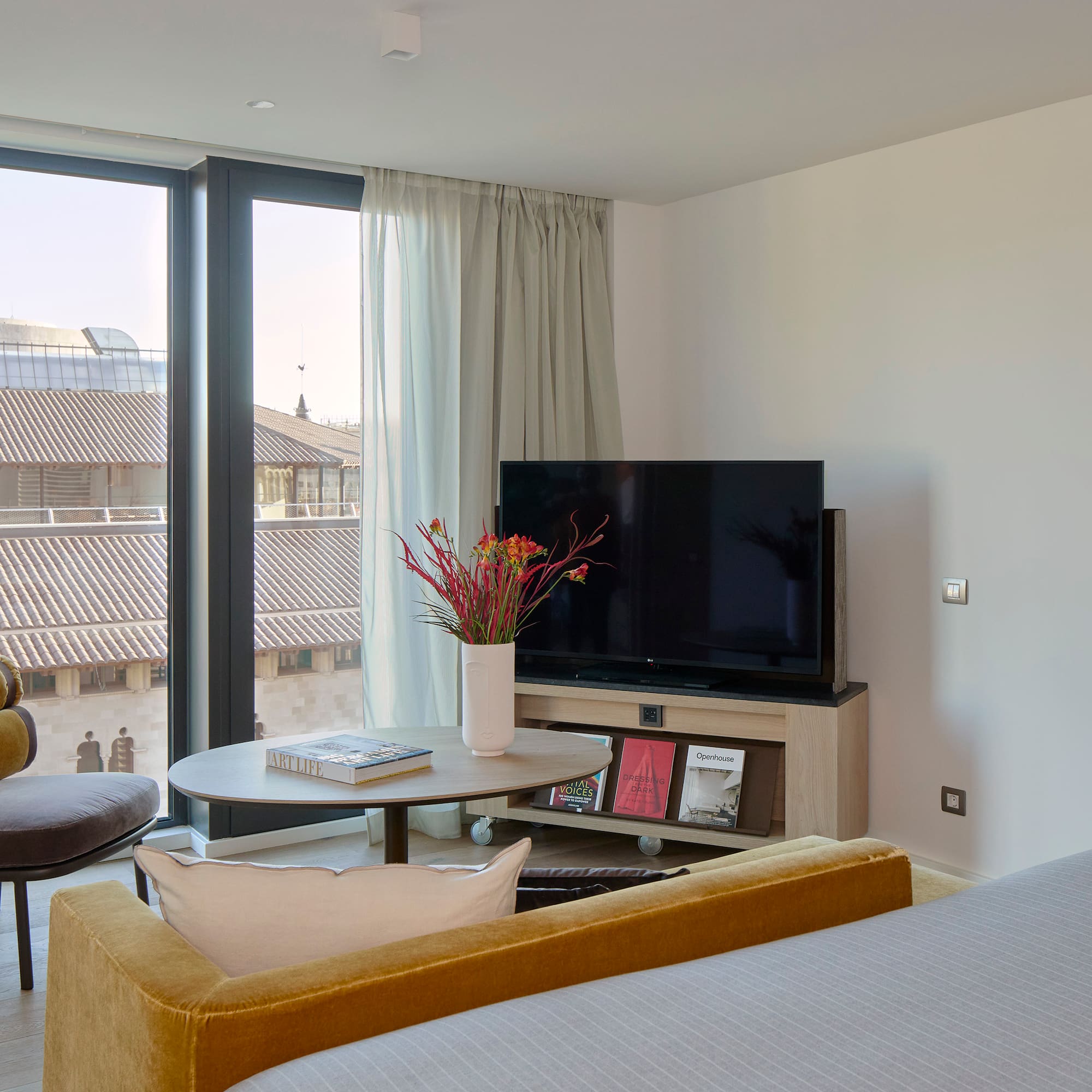 a room with a television and a chair