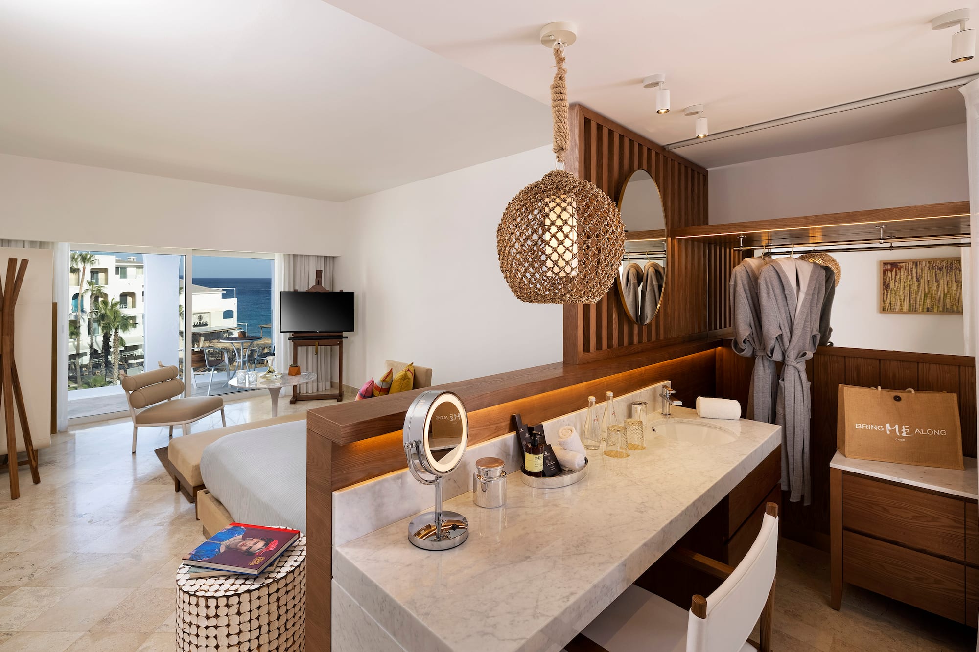 a room with a bed and a mirror