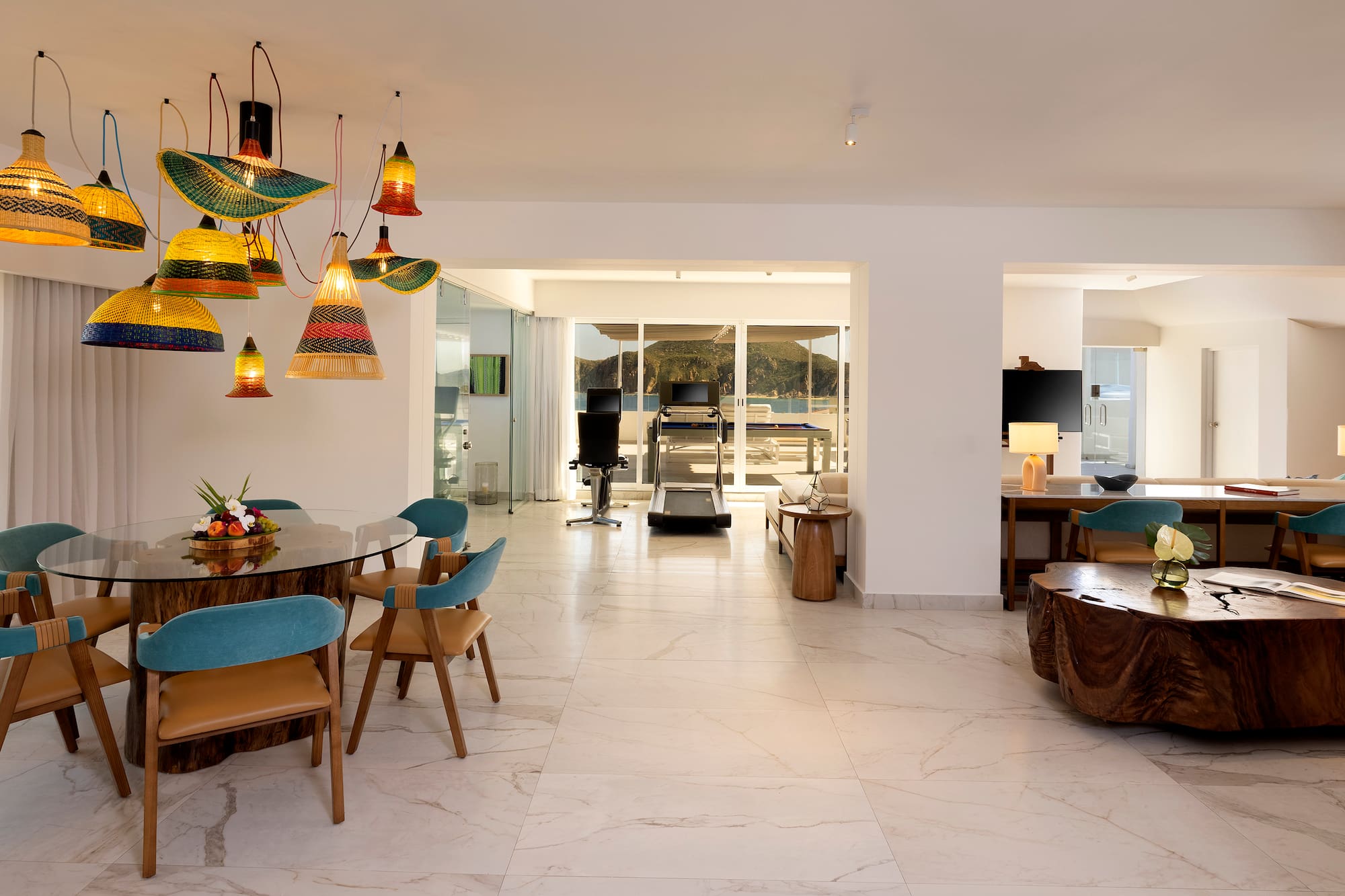 a room with a table and chairs