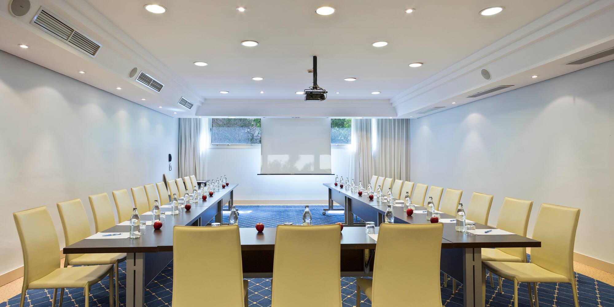 a room with a table and chairs