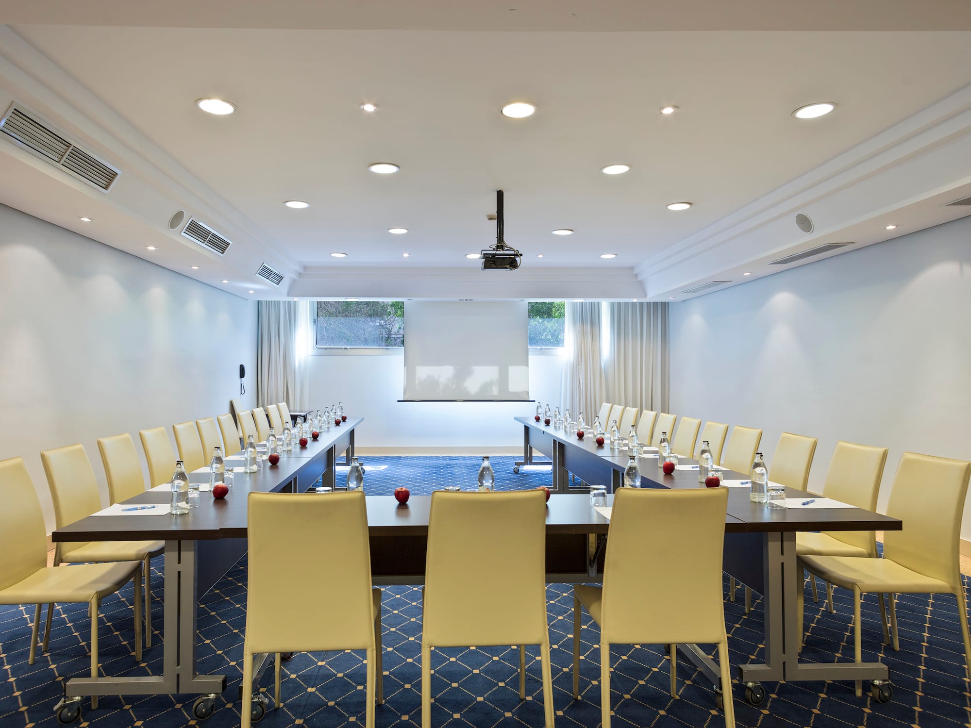 a room with a table and chairs