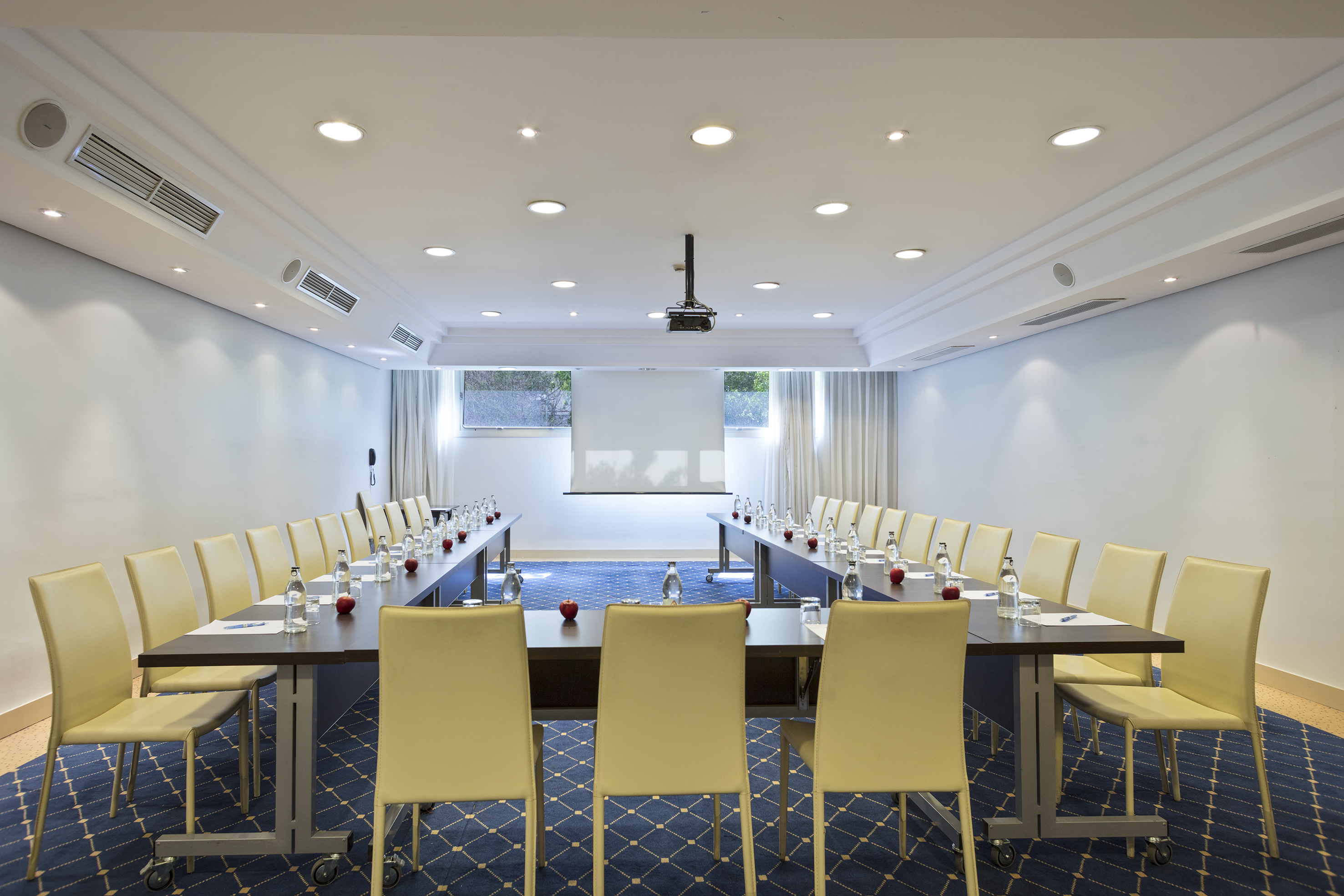 a room with a table and chairs