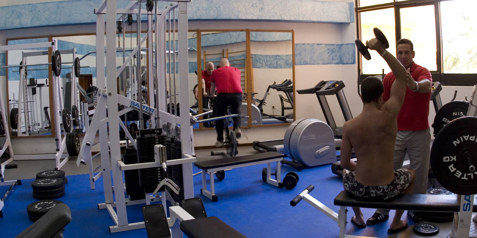 a group of men in a gym