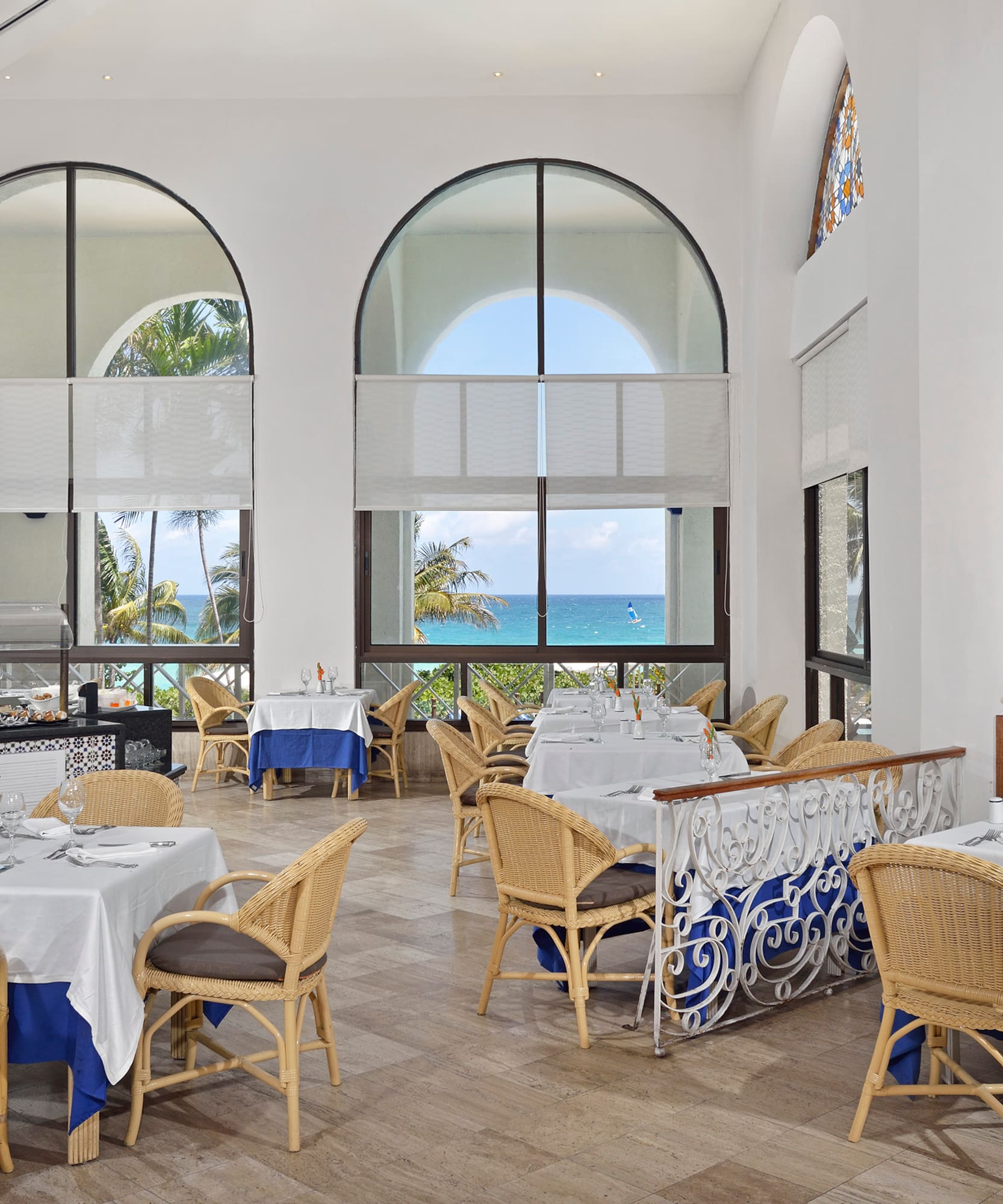a restaurant with tables and chairs