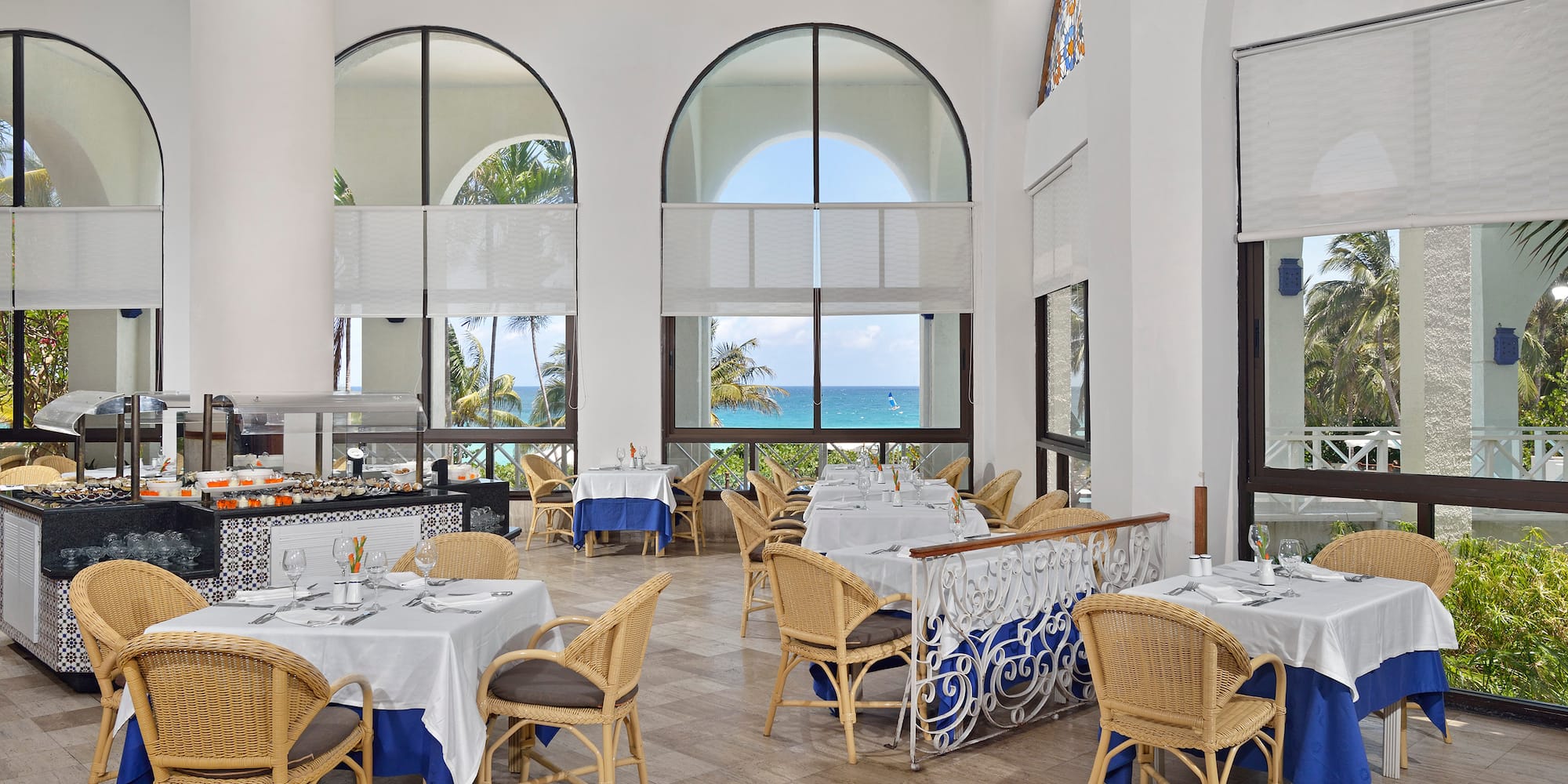 a restaurant with tables and chairs