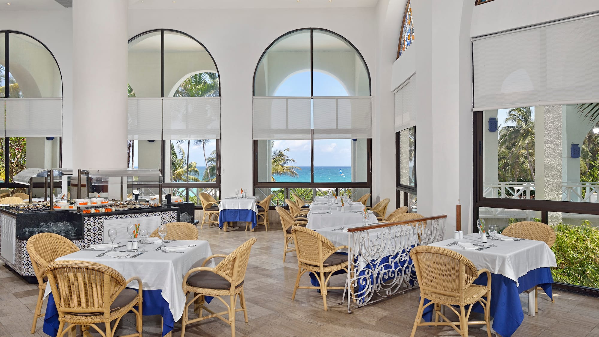 a restaurant with tables and chairs