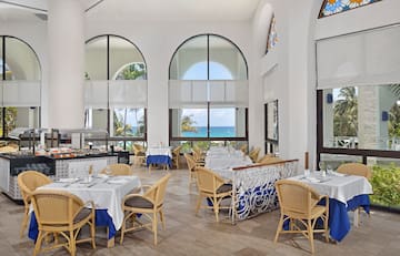 a restaurant with tables and chairs