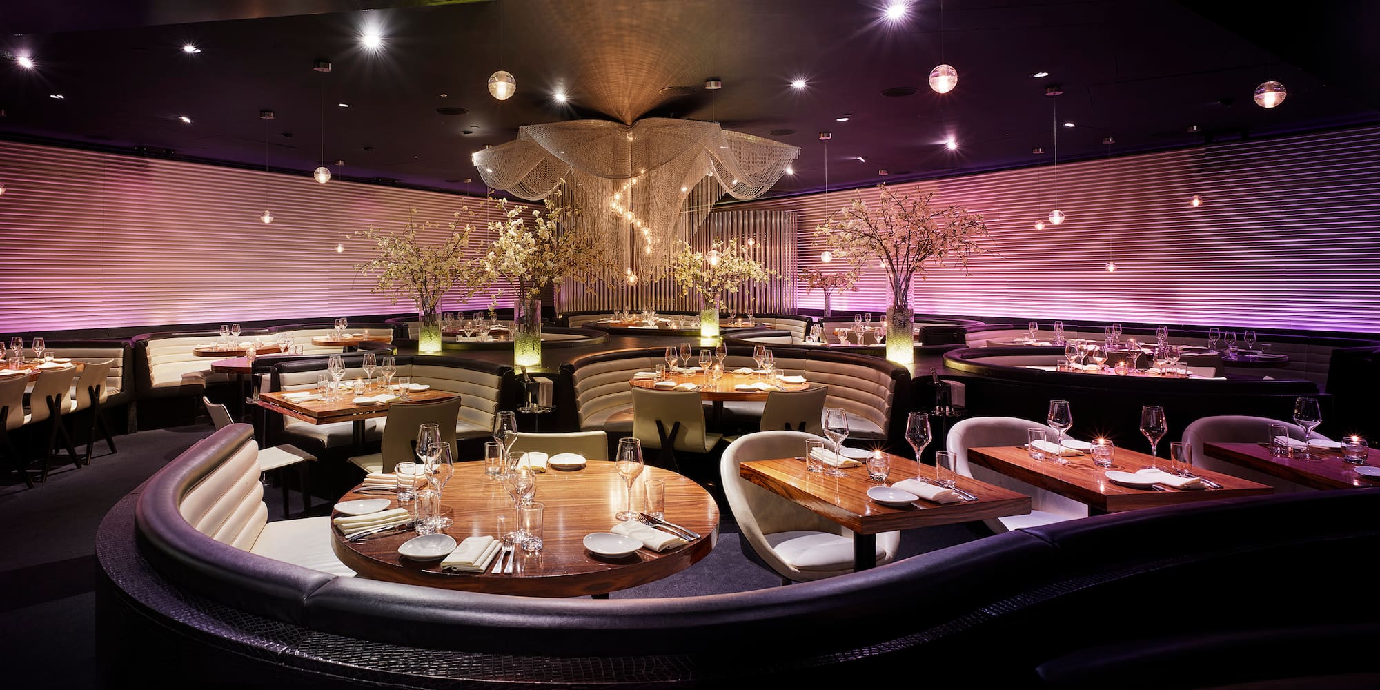 a restaurant with tables and chairs