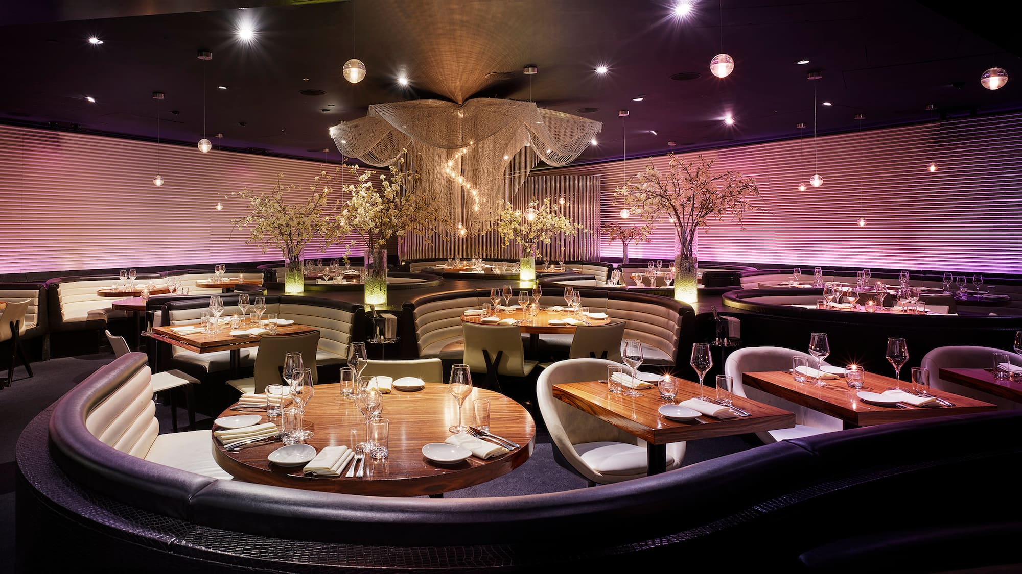 a restaurant with tables and chairs