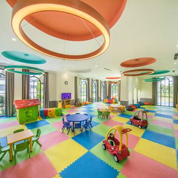 a large room with colorful playroom