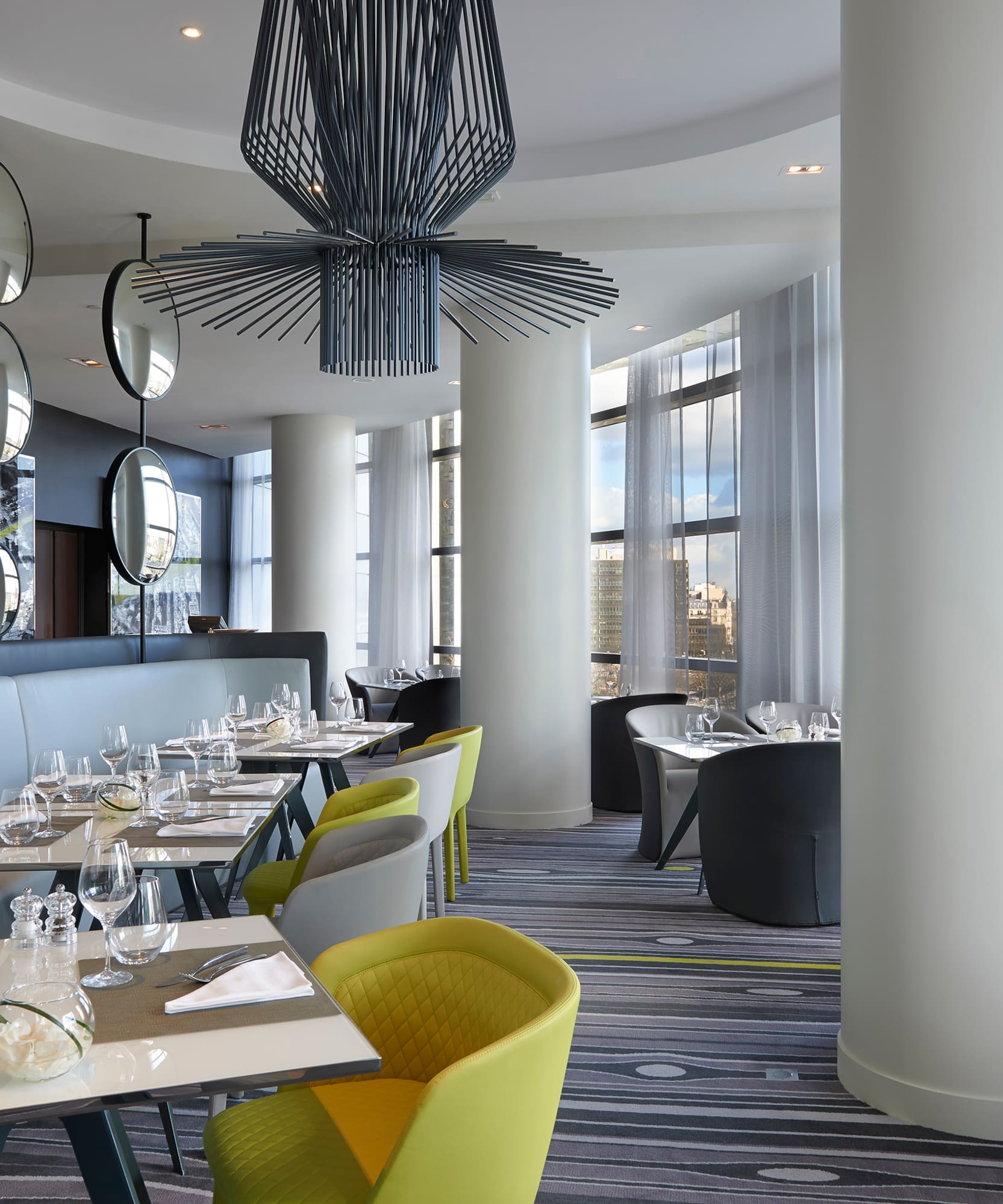 a restaurant with tables and chairs