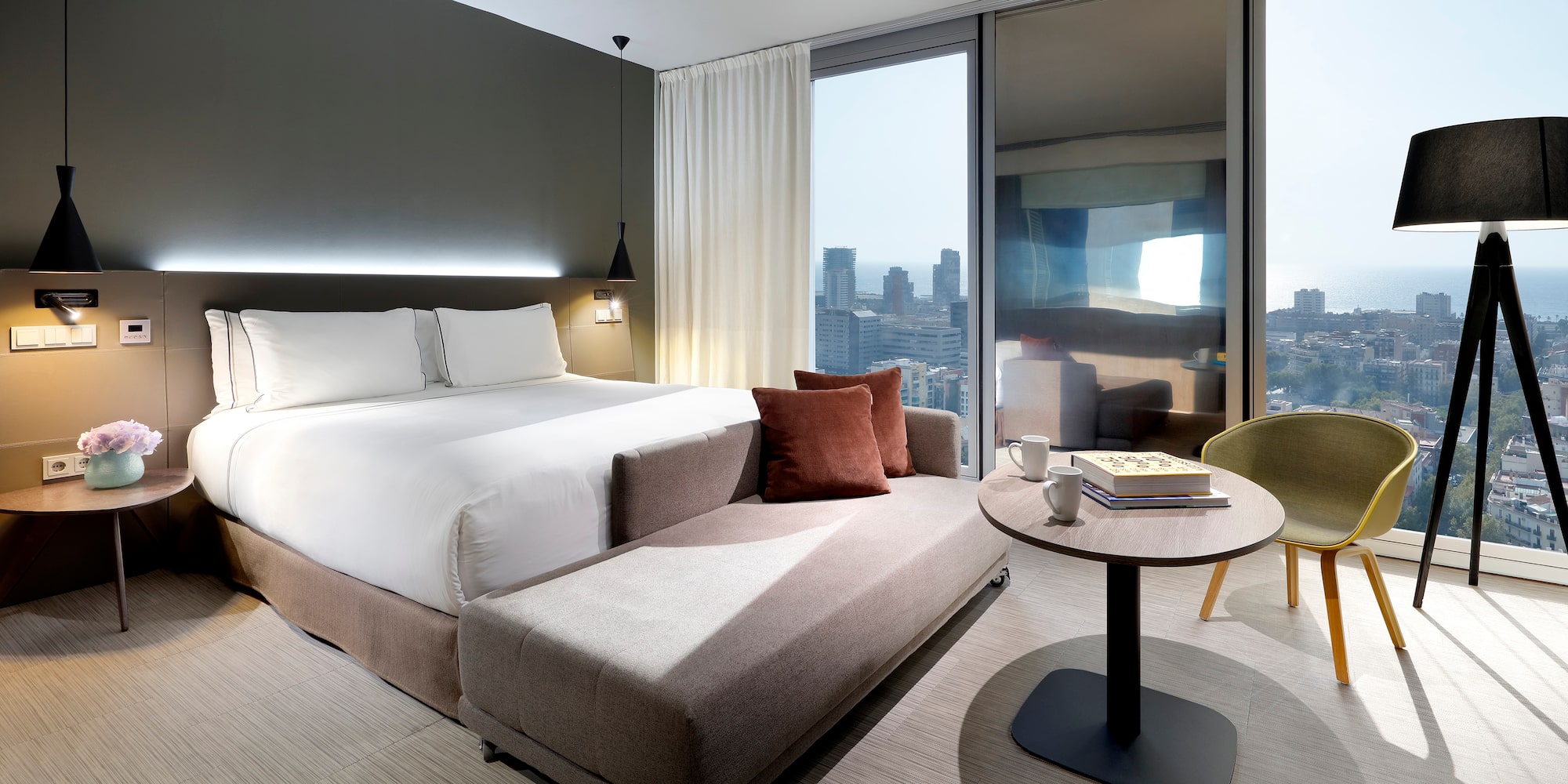 a bedroom with a bed and a table