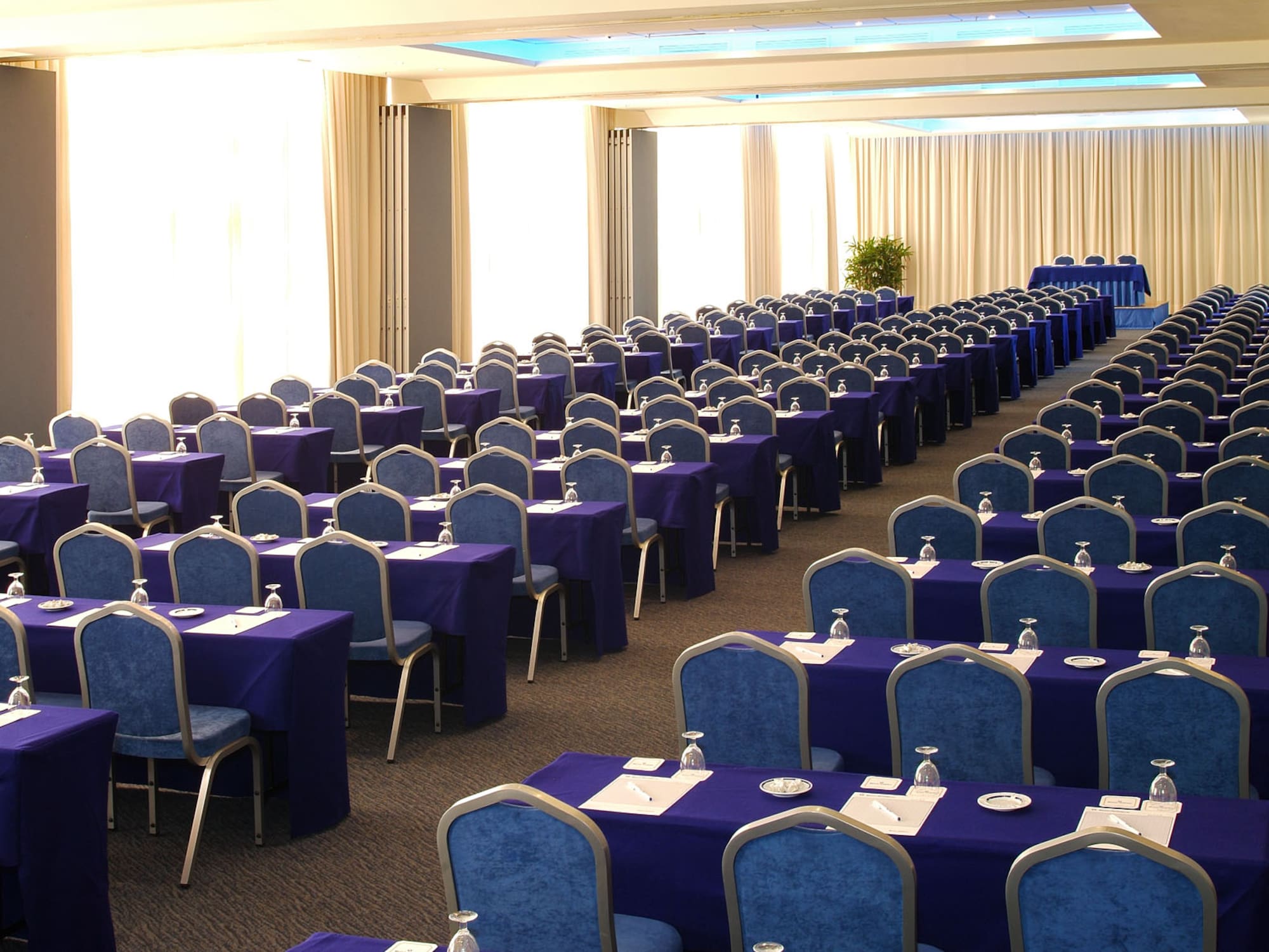long room with tables and chairs