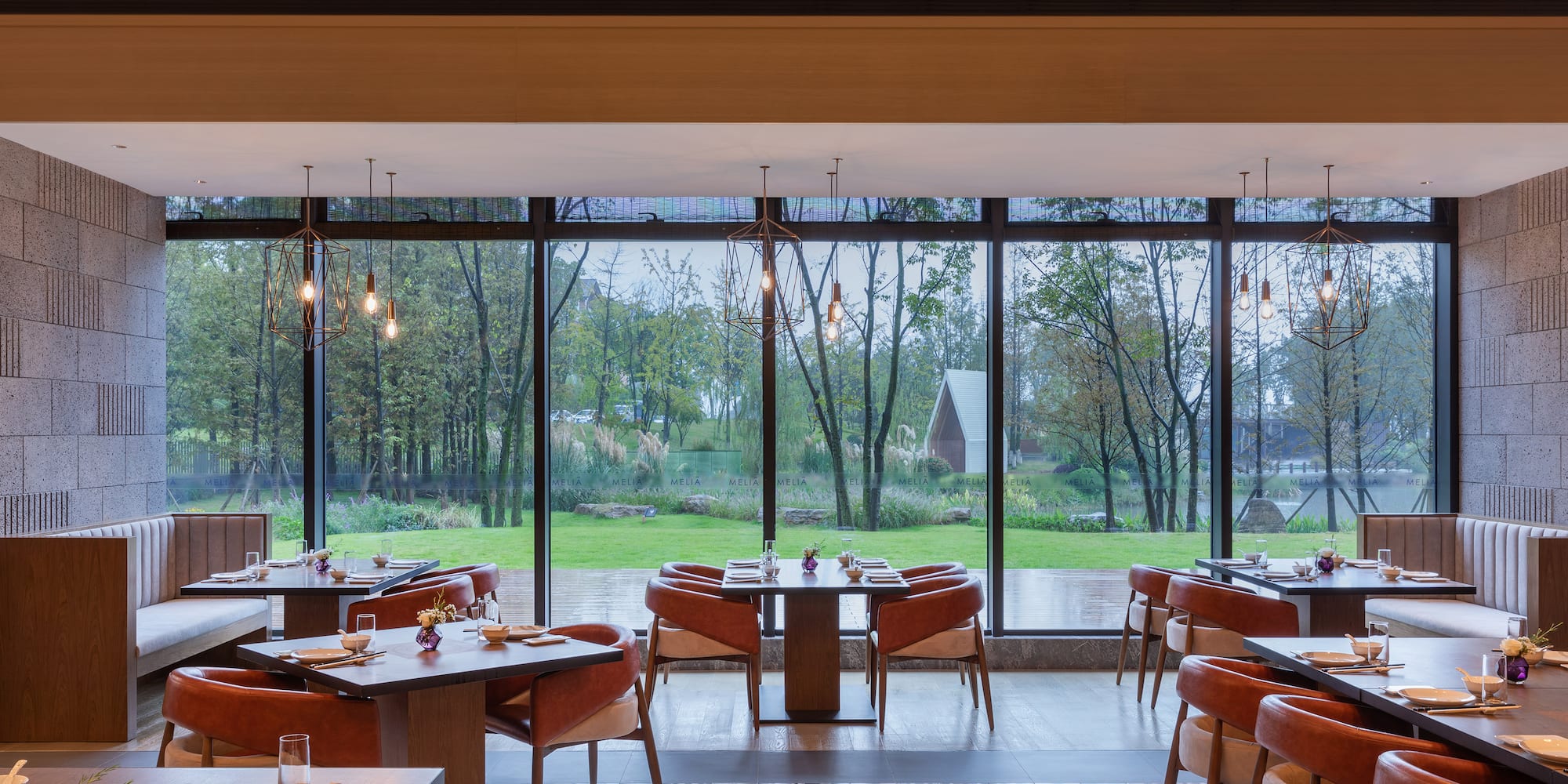a restaurant with tables and chairs