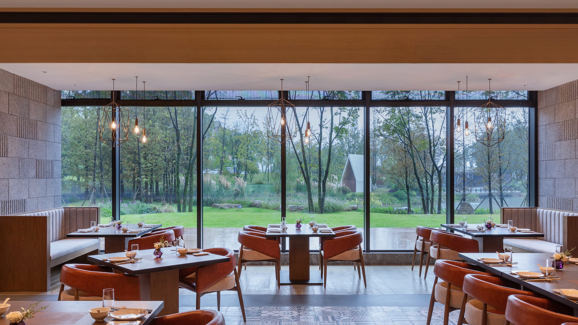 a restaurant with tables and chairs