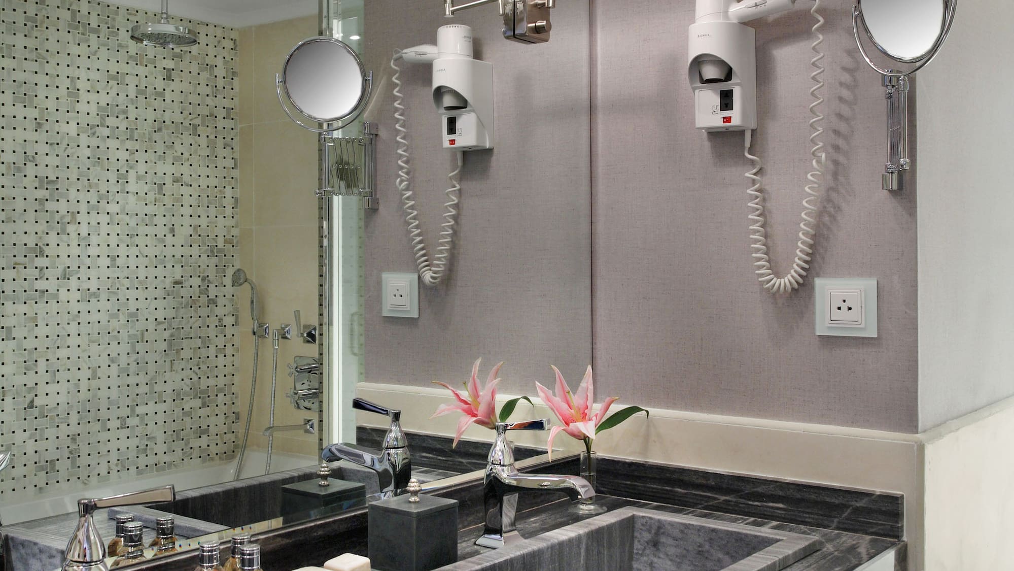 a bathroom with a mirror and sink