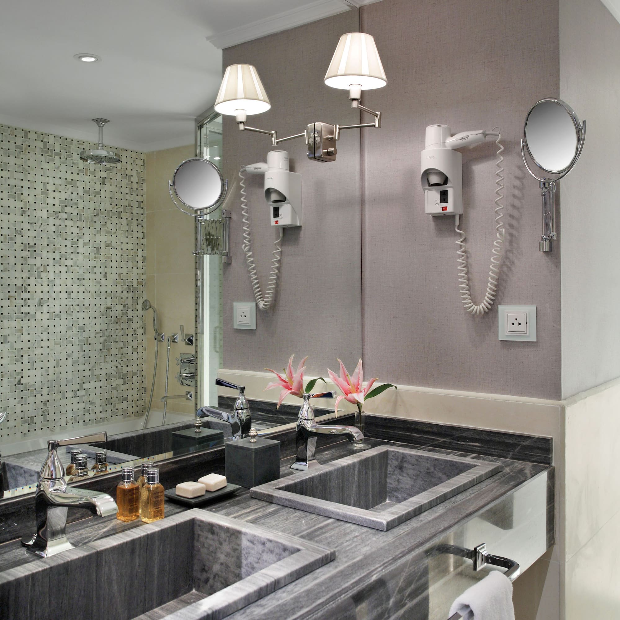 a bathroom with a mirror and sink