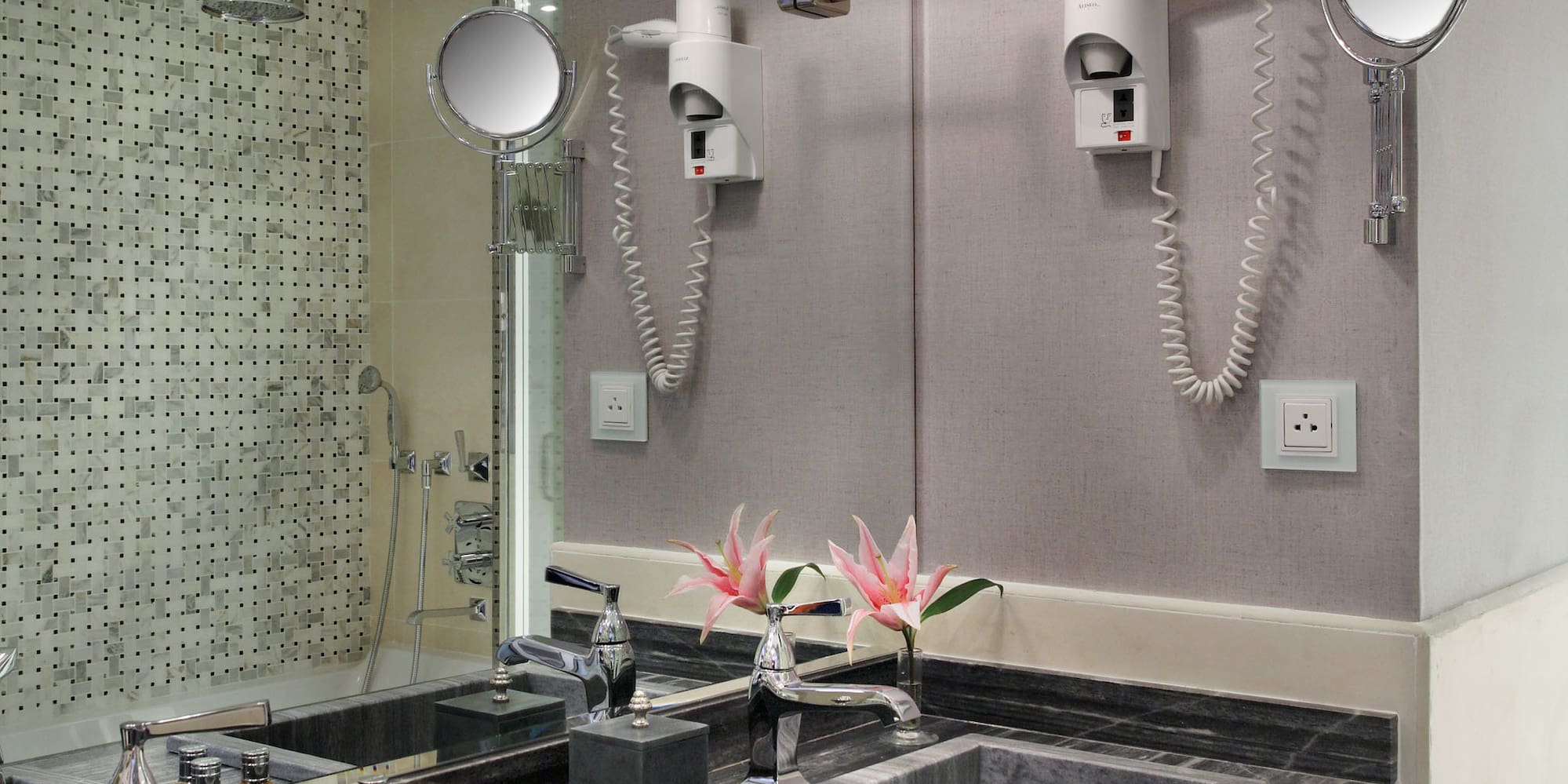 a bathroom with a mirror and sink