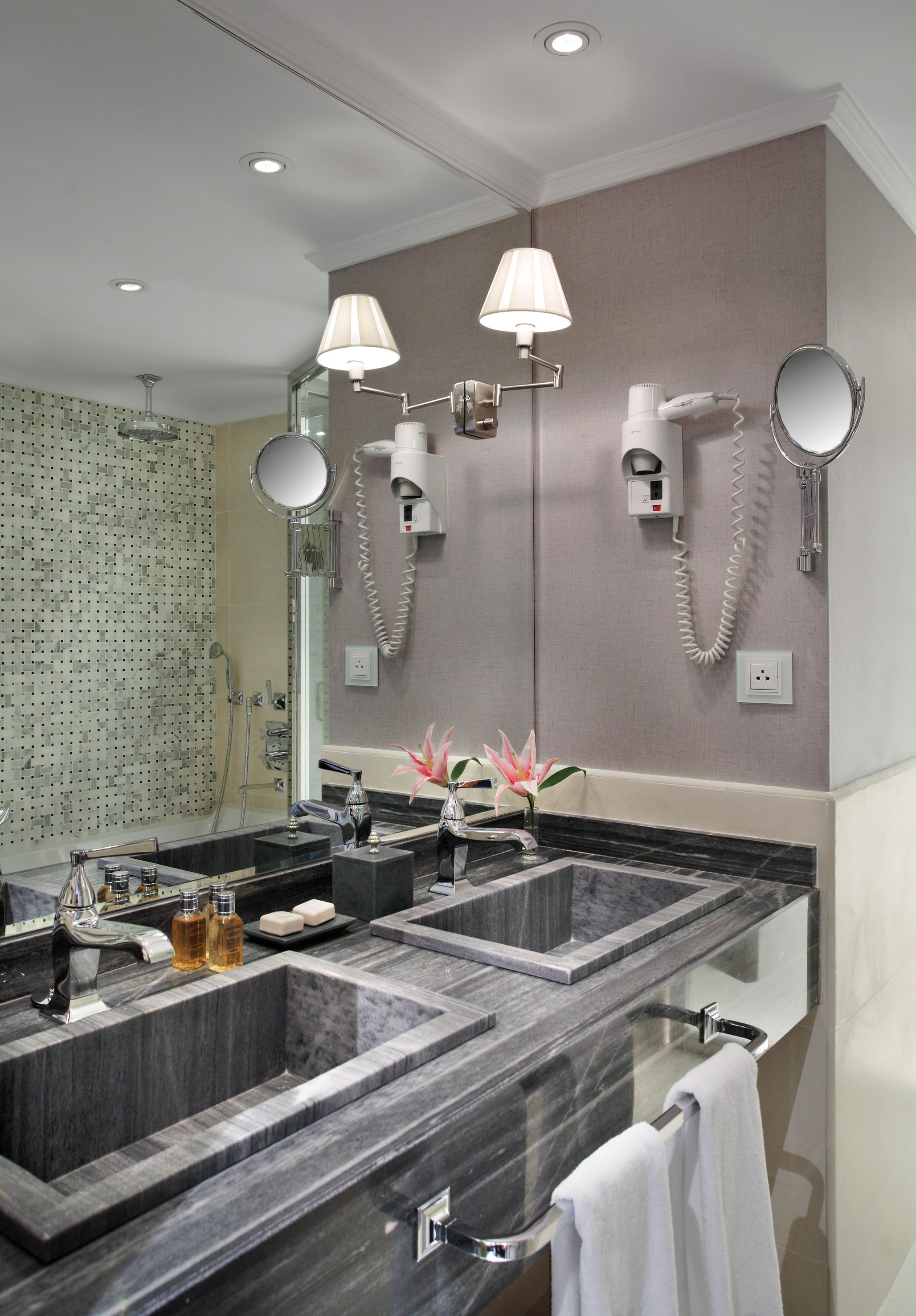 a bathroom with a mirror and sink