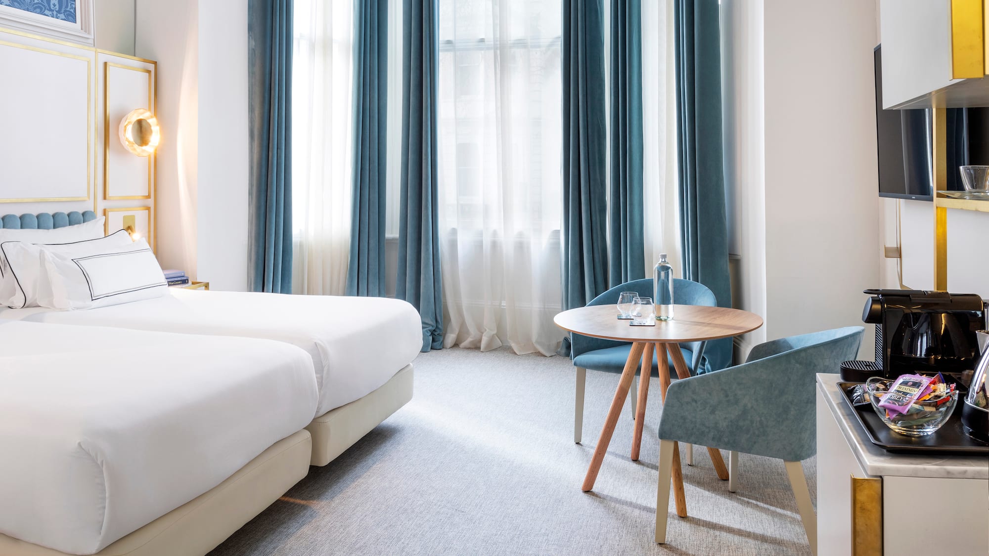 a room with a table and chairs