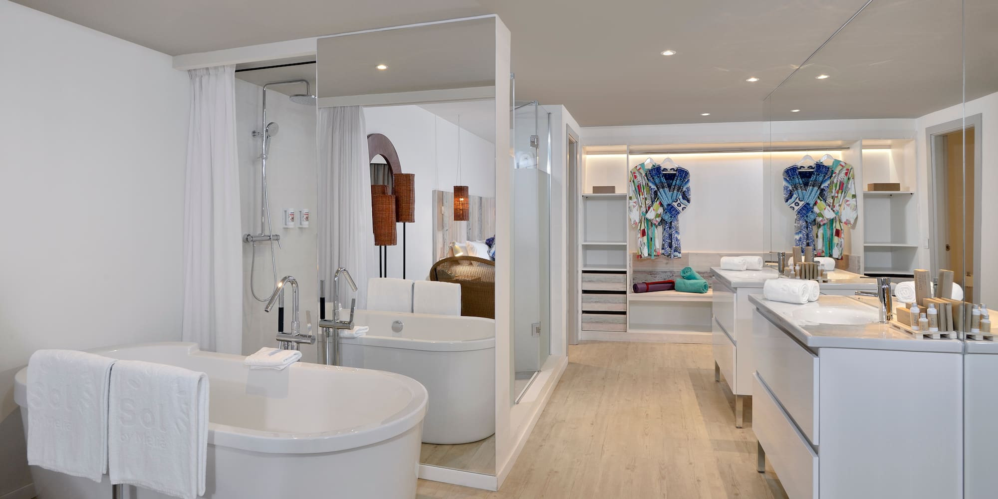 a bathroom with a tub and a shower