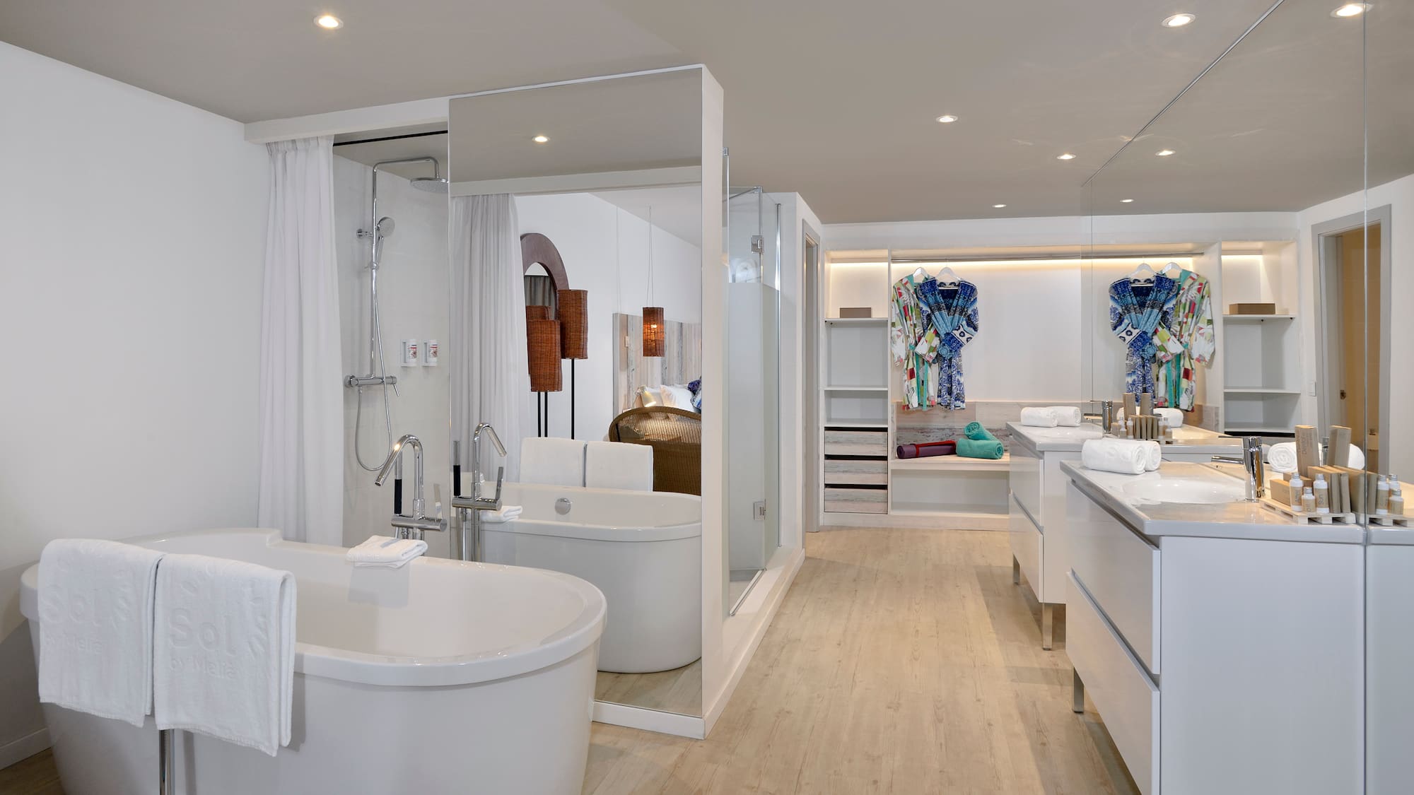 a bathroom with a tub and a shower