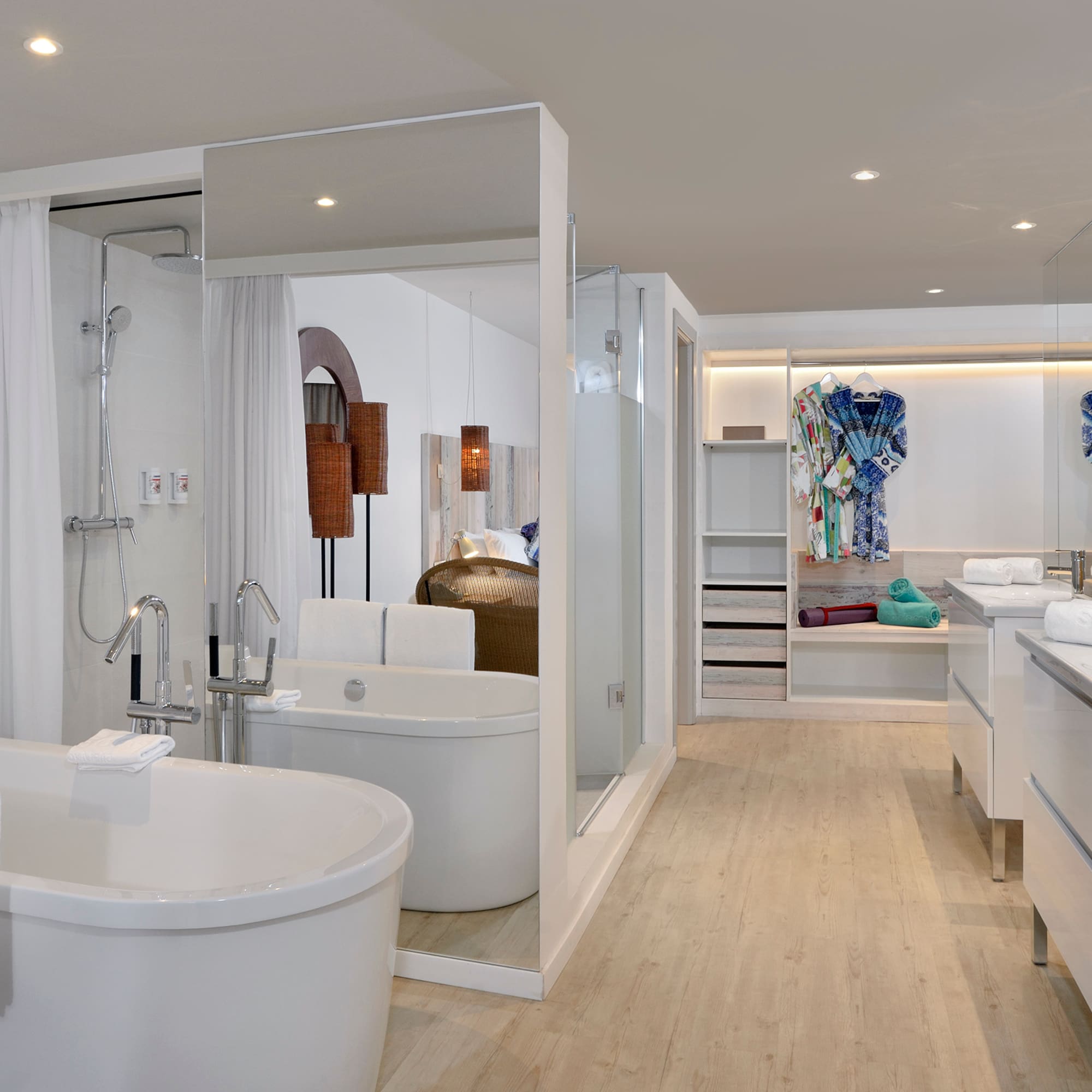 a bathroom with a tub and a shower