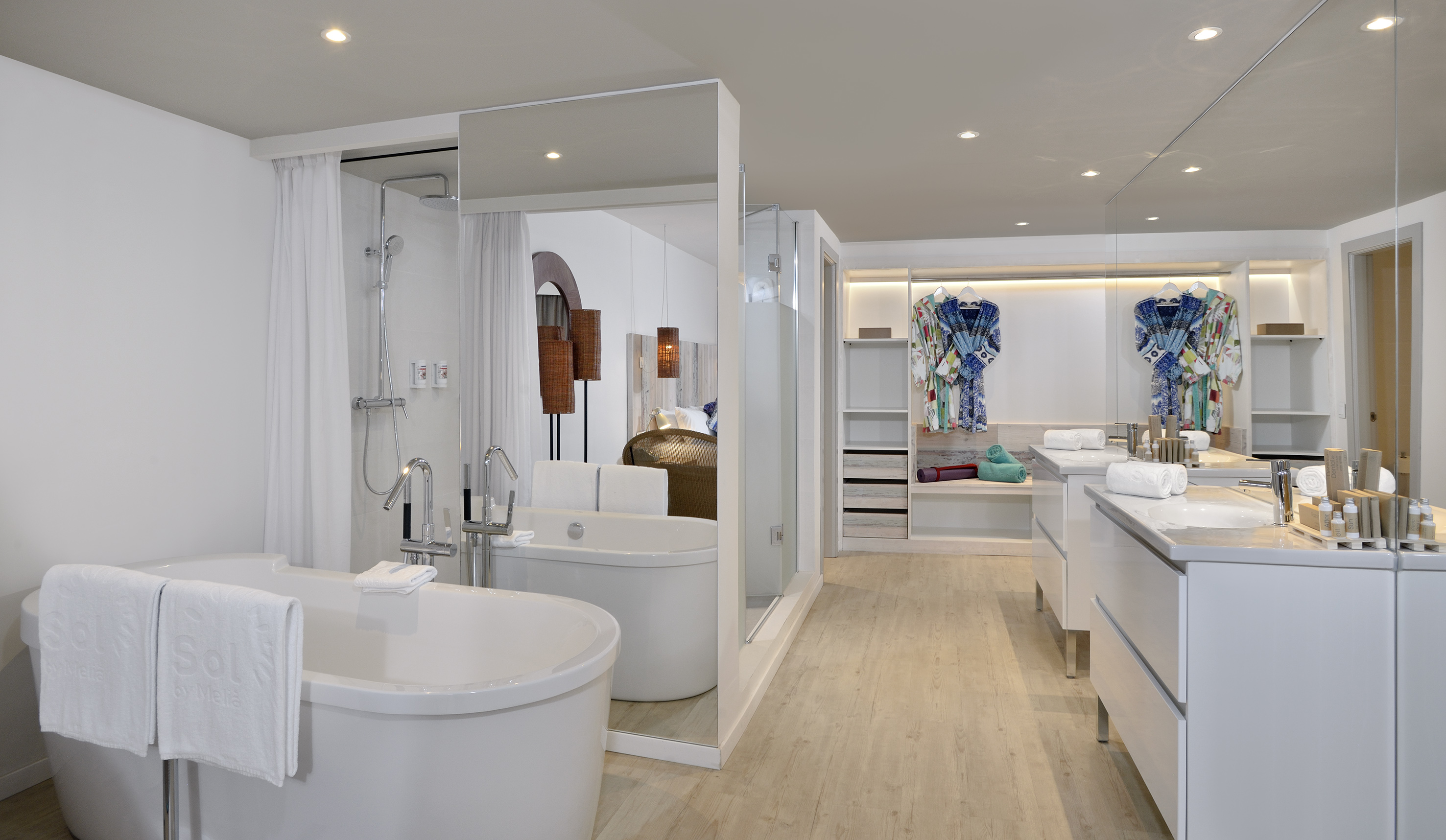 a bathroom with a tub and a shower