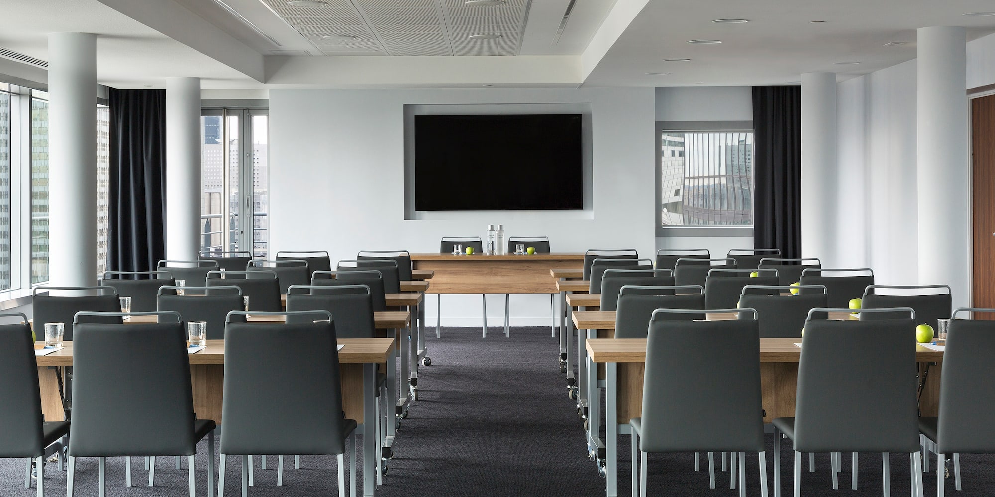 a room with tables and chairs