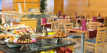 a buffet table with food on it