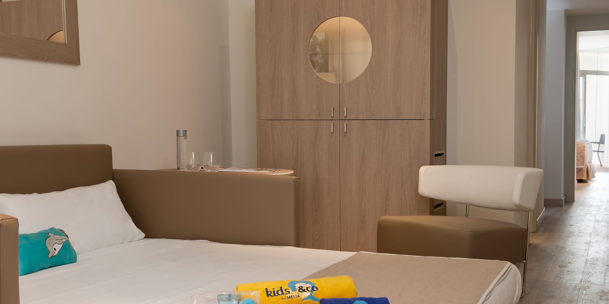 a bed with towels and yellow ducklings