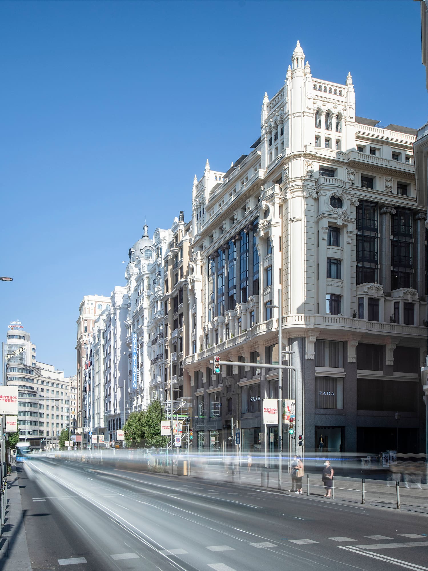 a street with buildings and cars on it