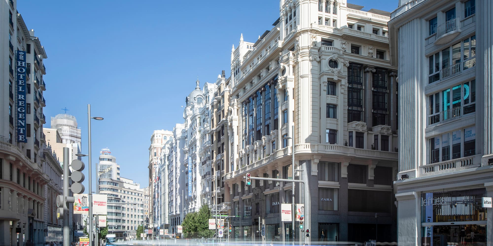 a street with buildings and cars on it