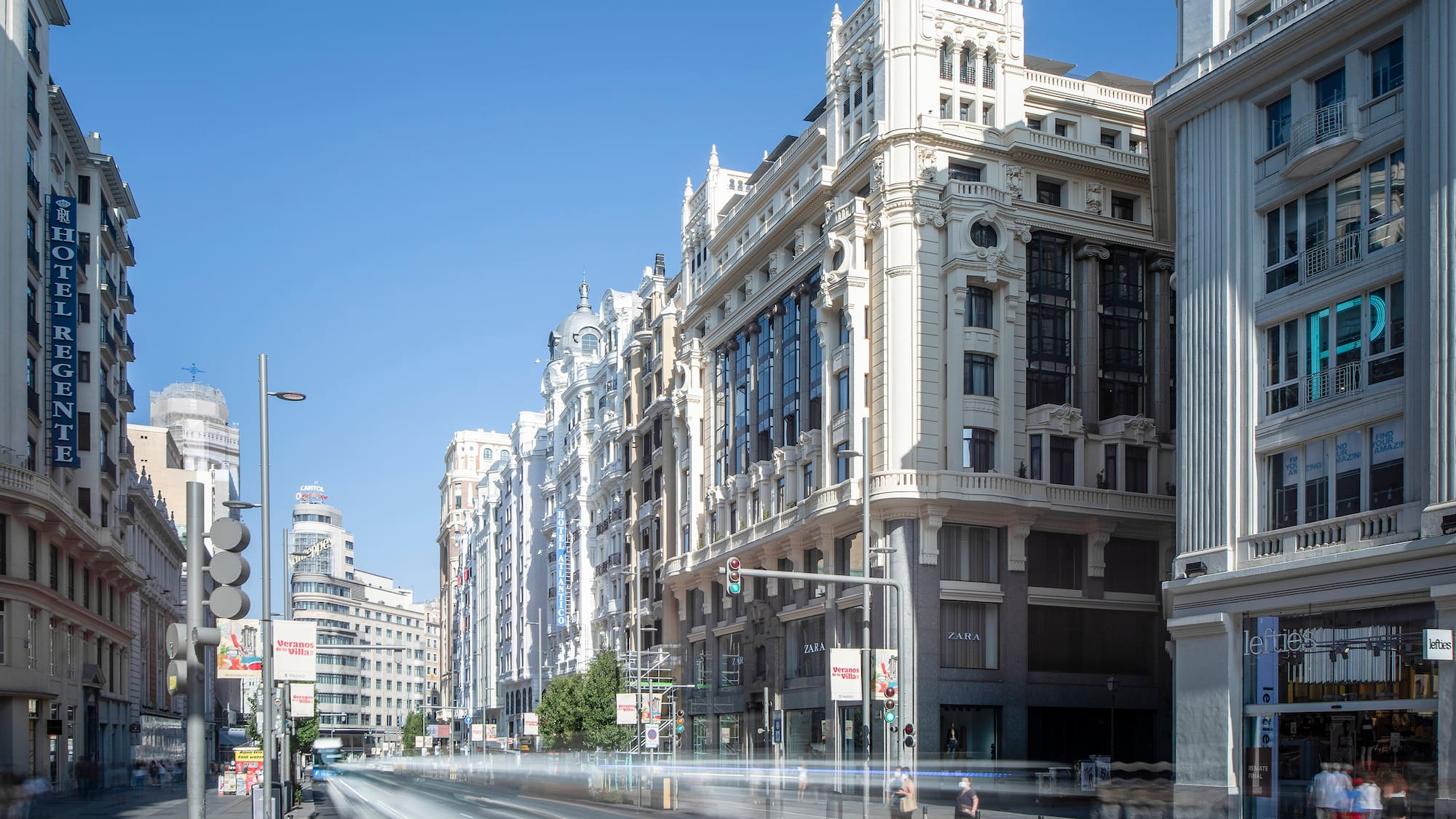 a street with buildings and cars on it
