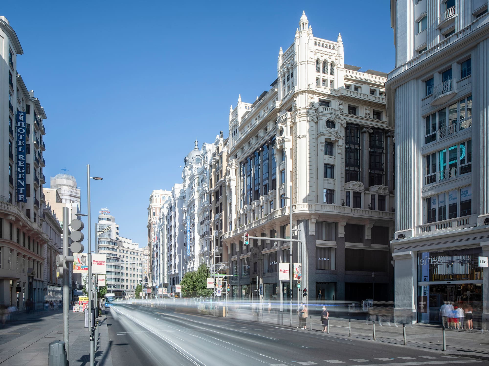 a street with buildings and cars on it