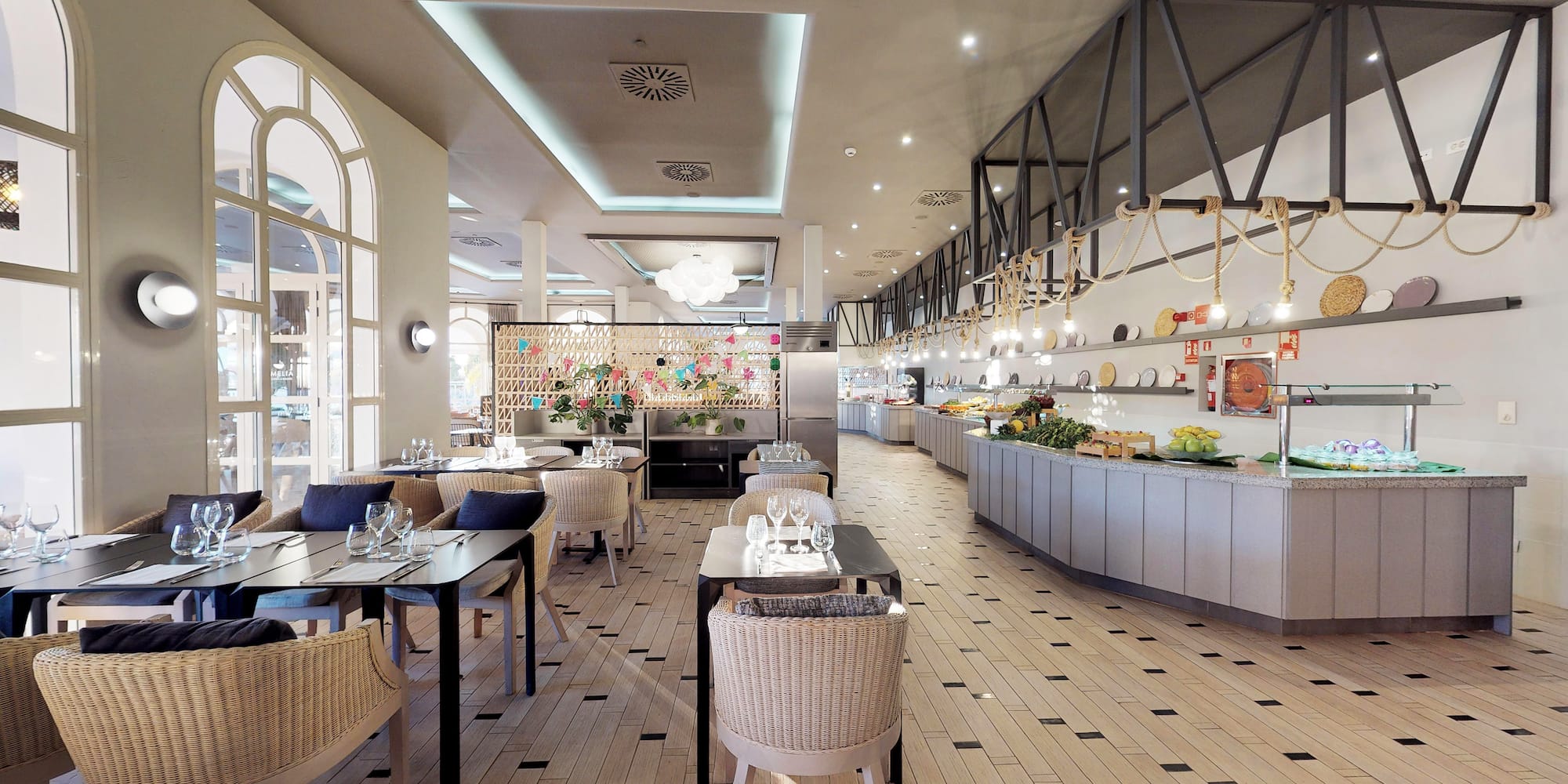 a restaurant with tables and chairs