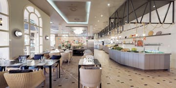 a restaurant with tables and chairs