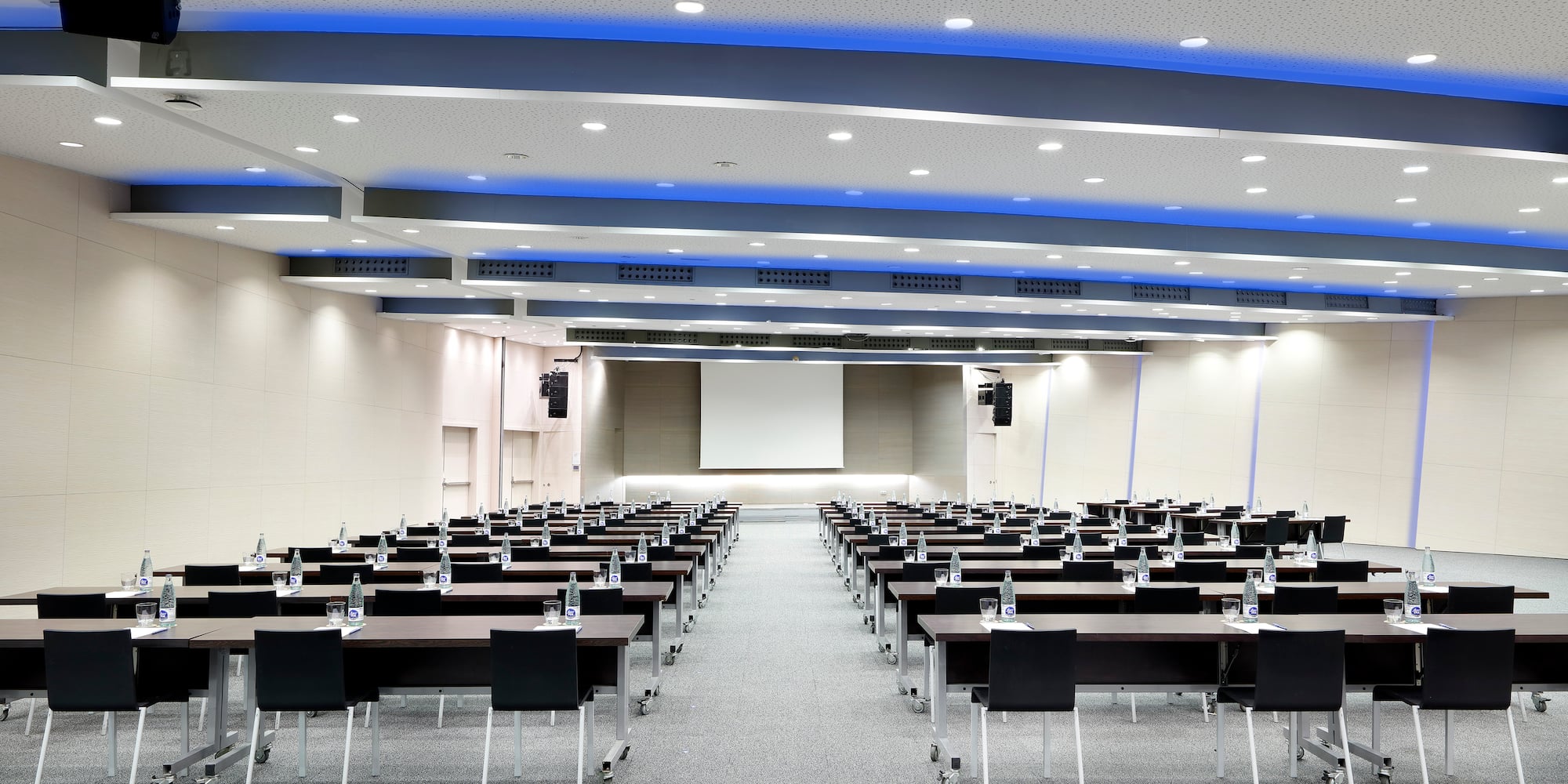 a room with tables and chairs