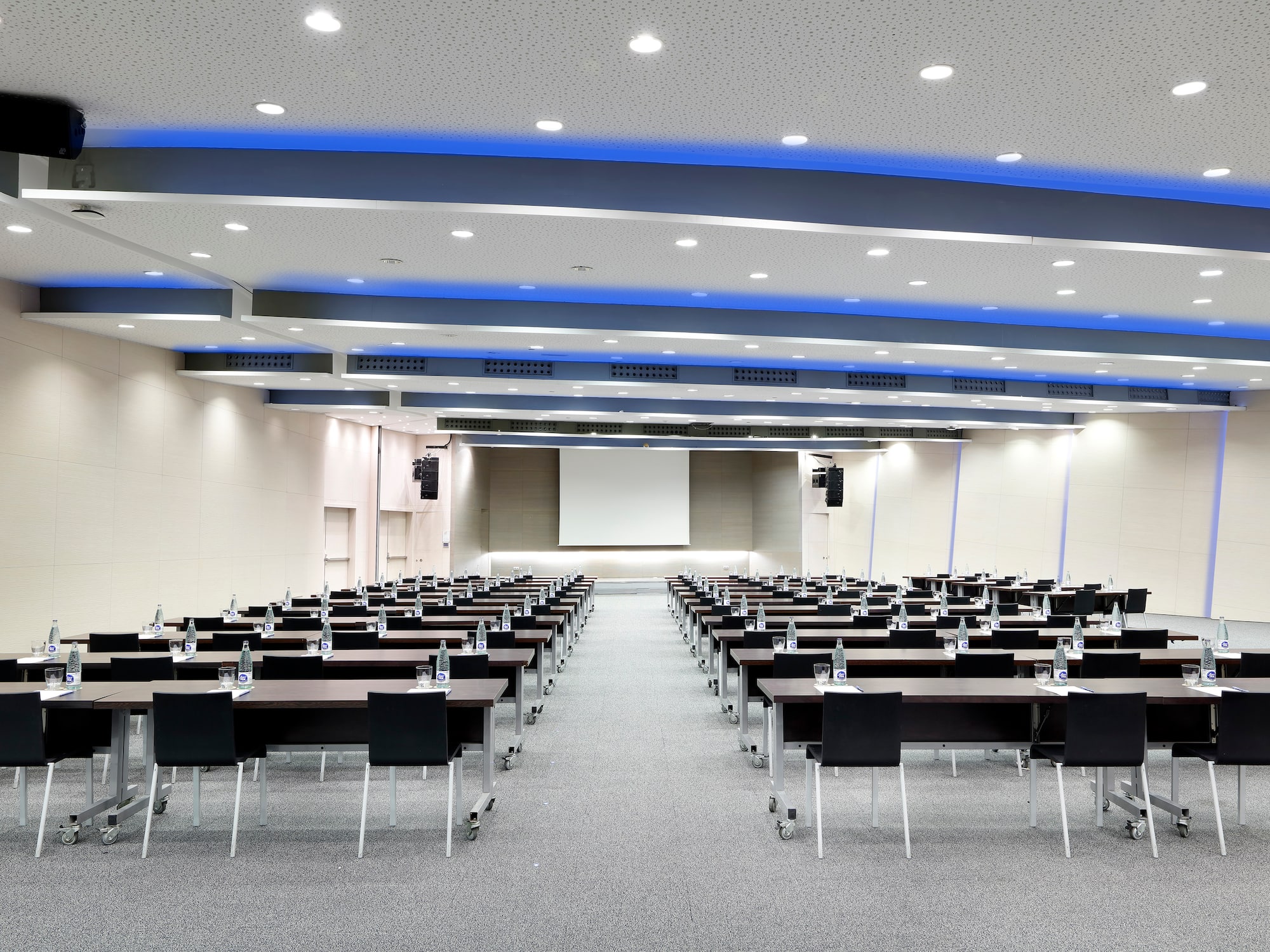 a room with tables and chairs