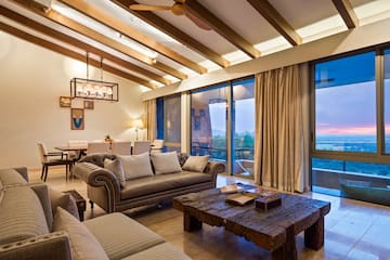 a living room with a couch and a table