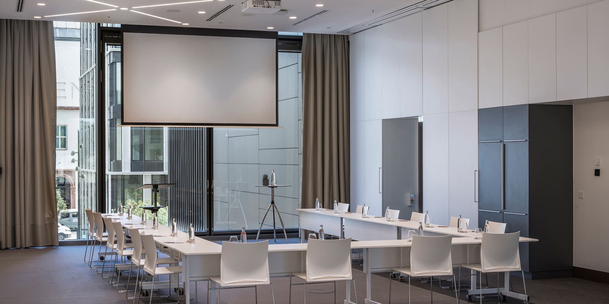 a room with a large screen