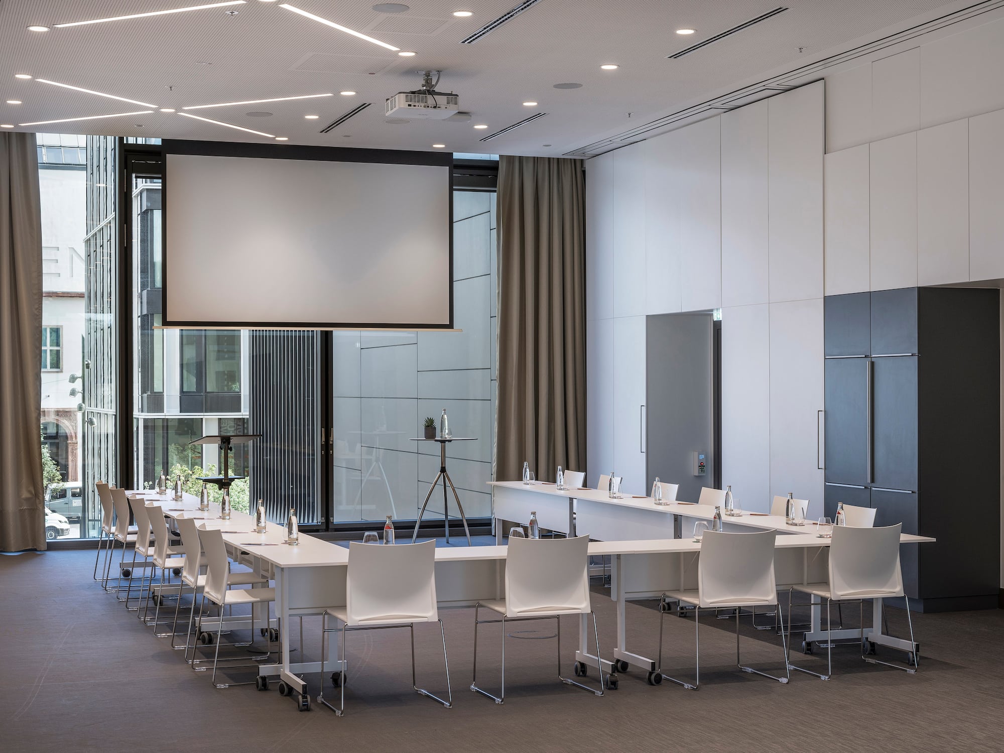 a room with a large screen