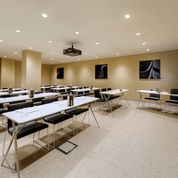 a room with tables and chairs