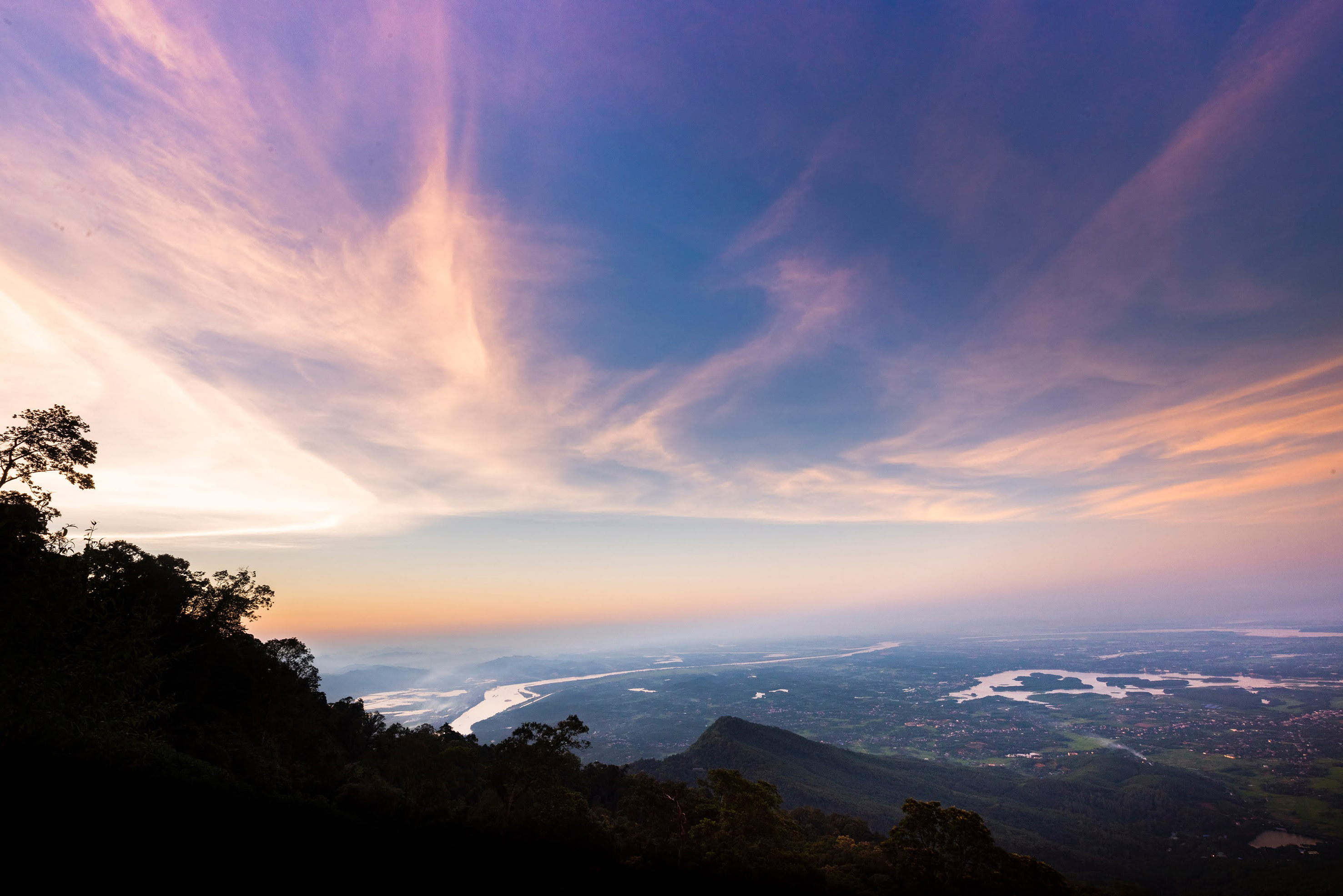 a view of a city from a mountain