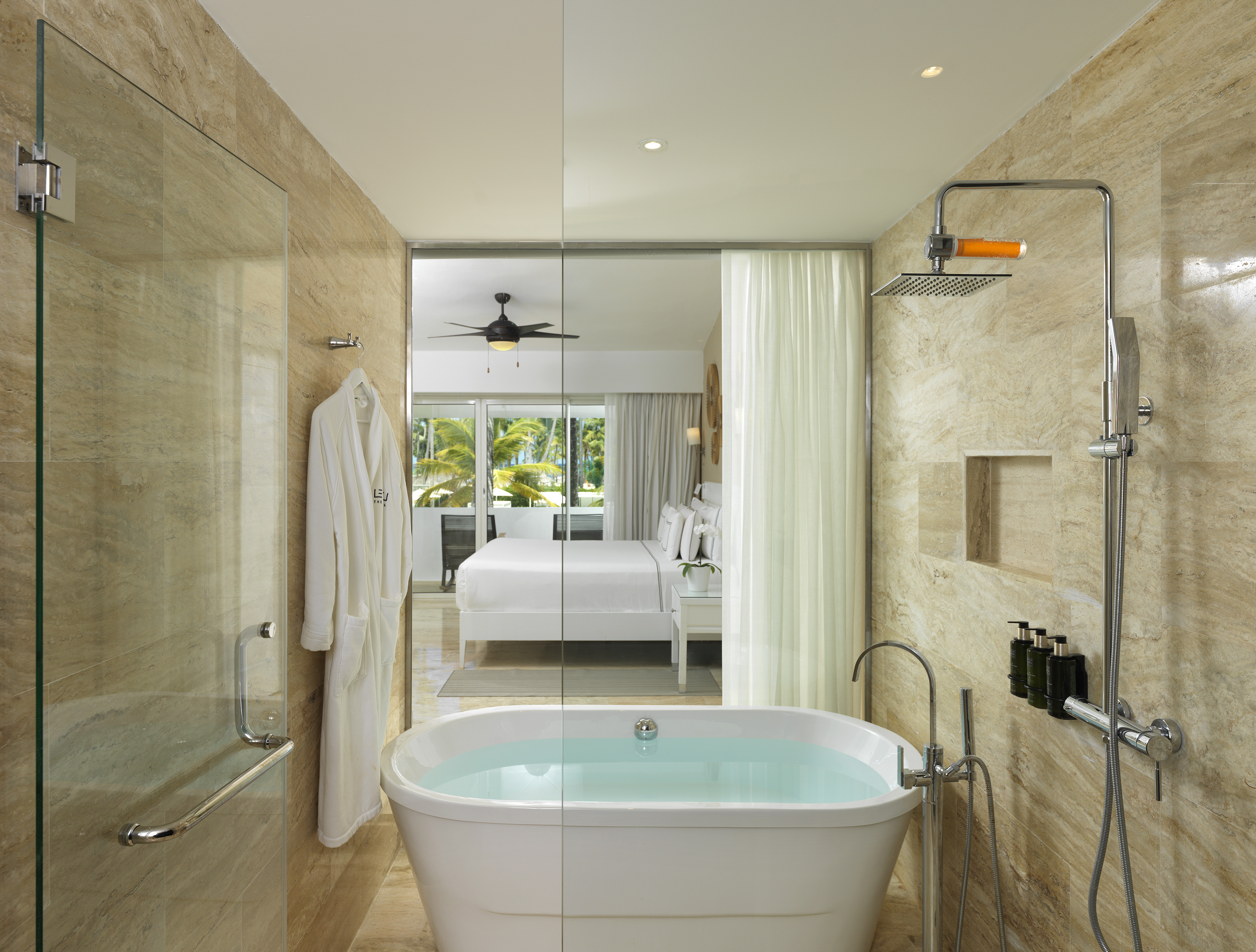 a bathroom with a bathtub and shower