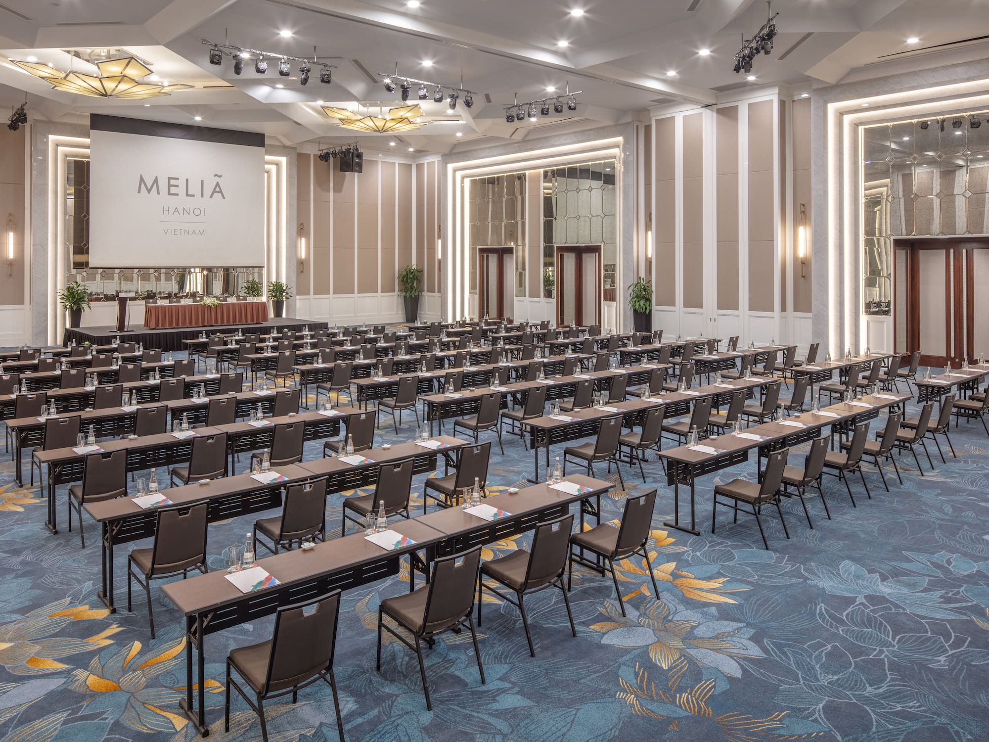 a large room with tables and chairs