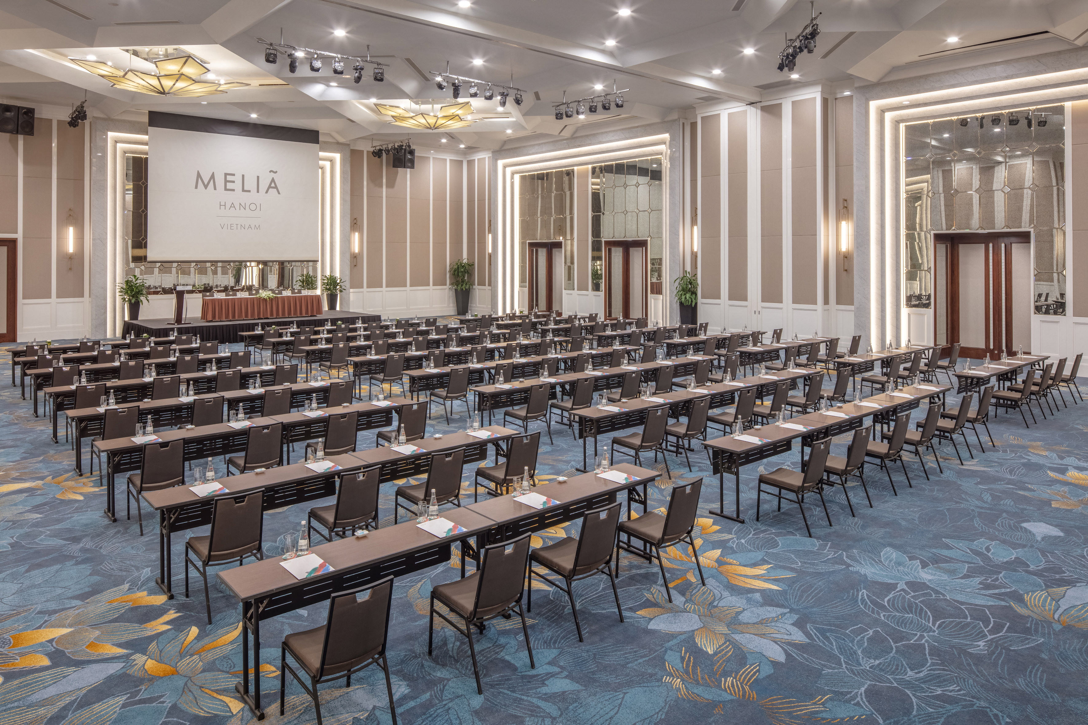a large room with tables and chairs