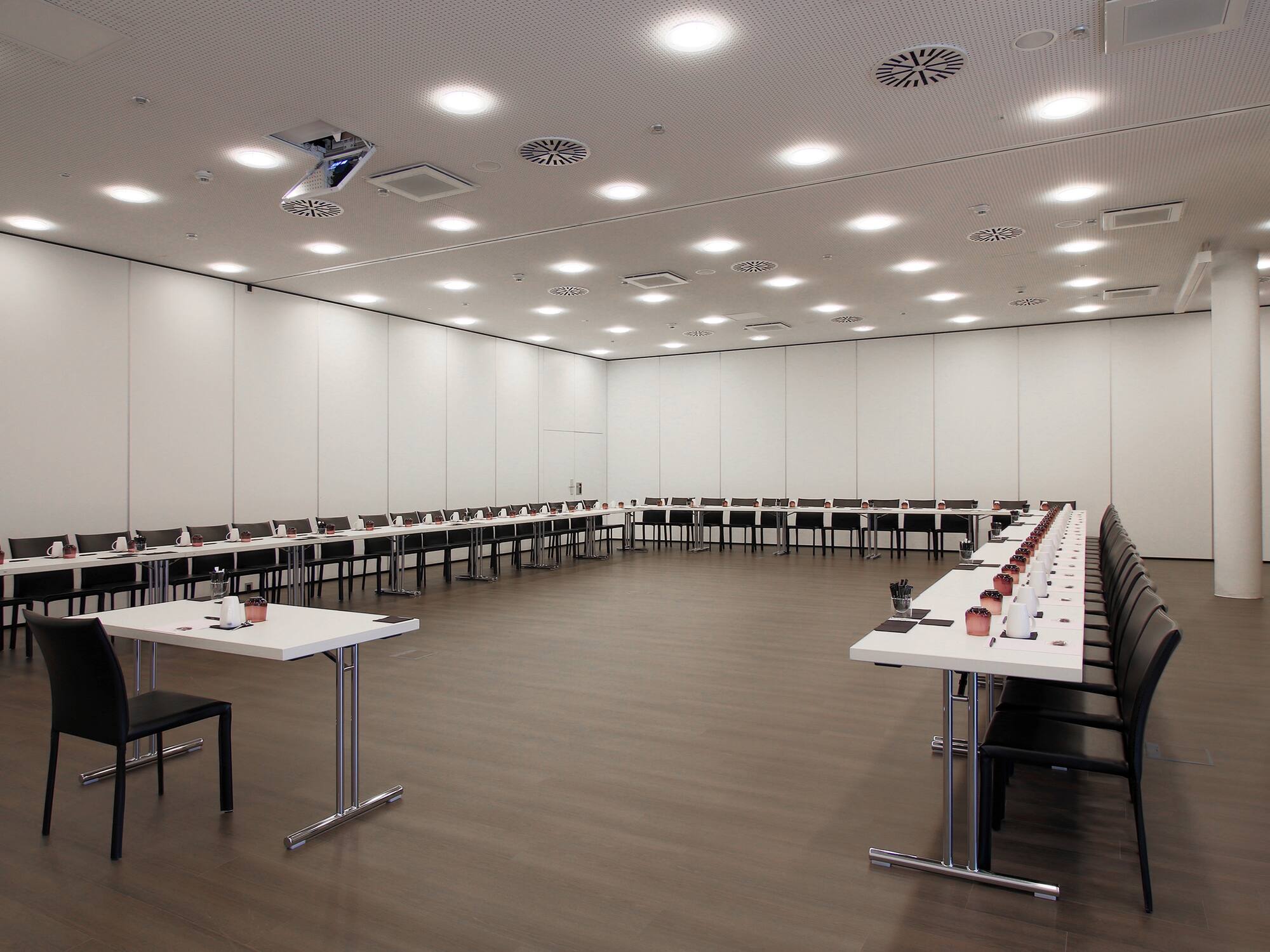 a room with tables and chairs