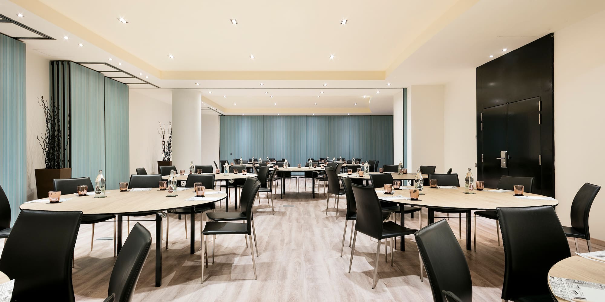 a room with tables and chairs